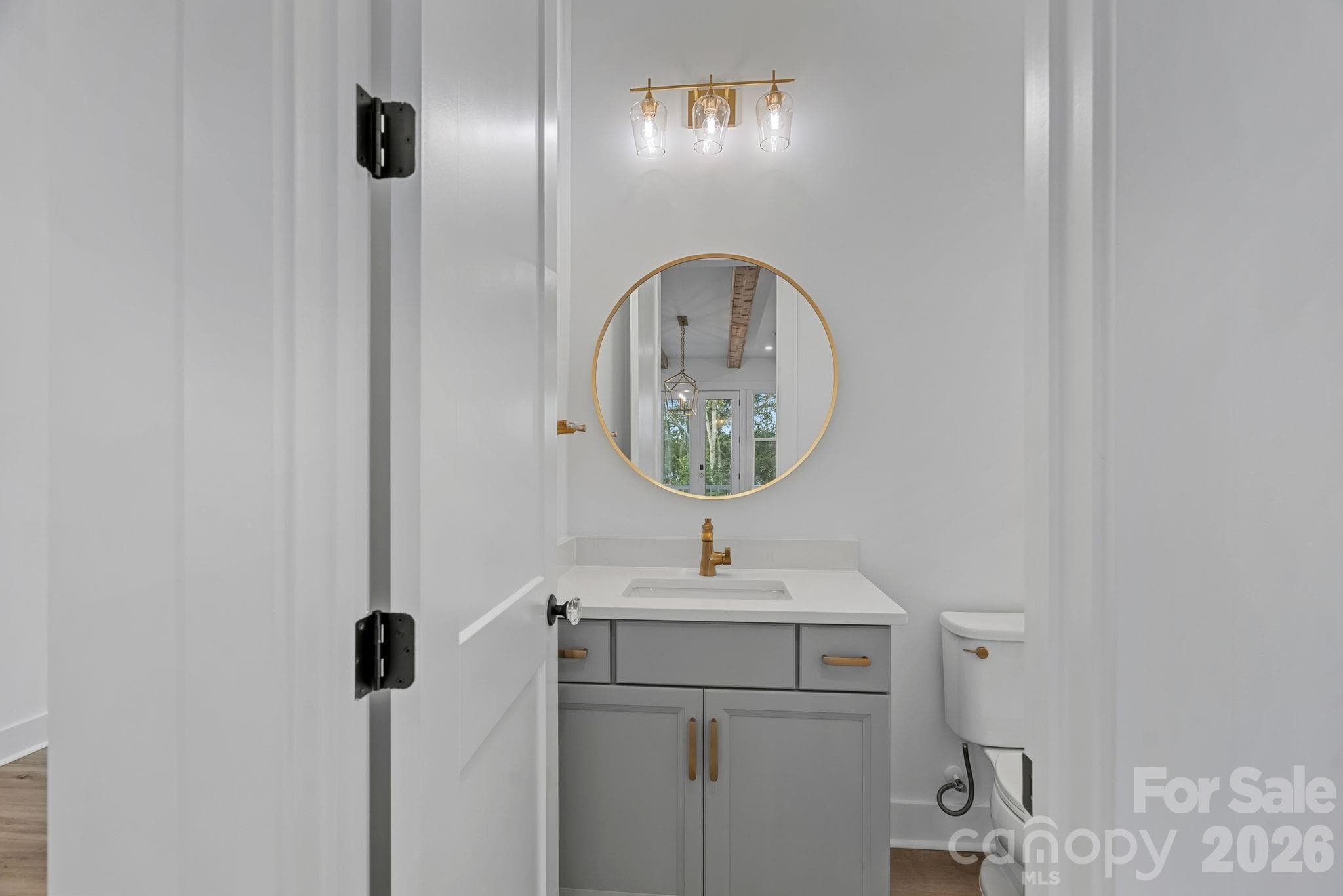 Main-level powder room, off the Kitchen/Great Room - 4477 Splash Trail, Sherrills Ford