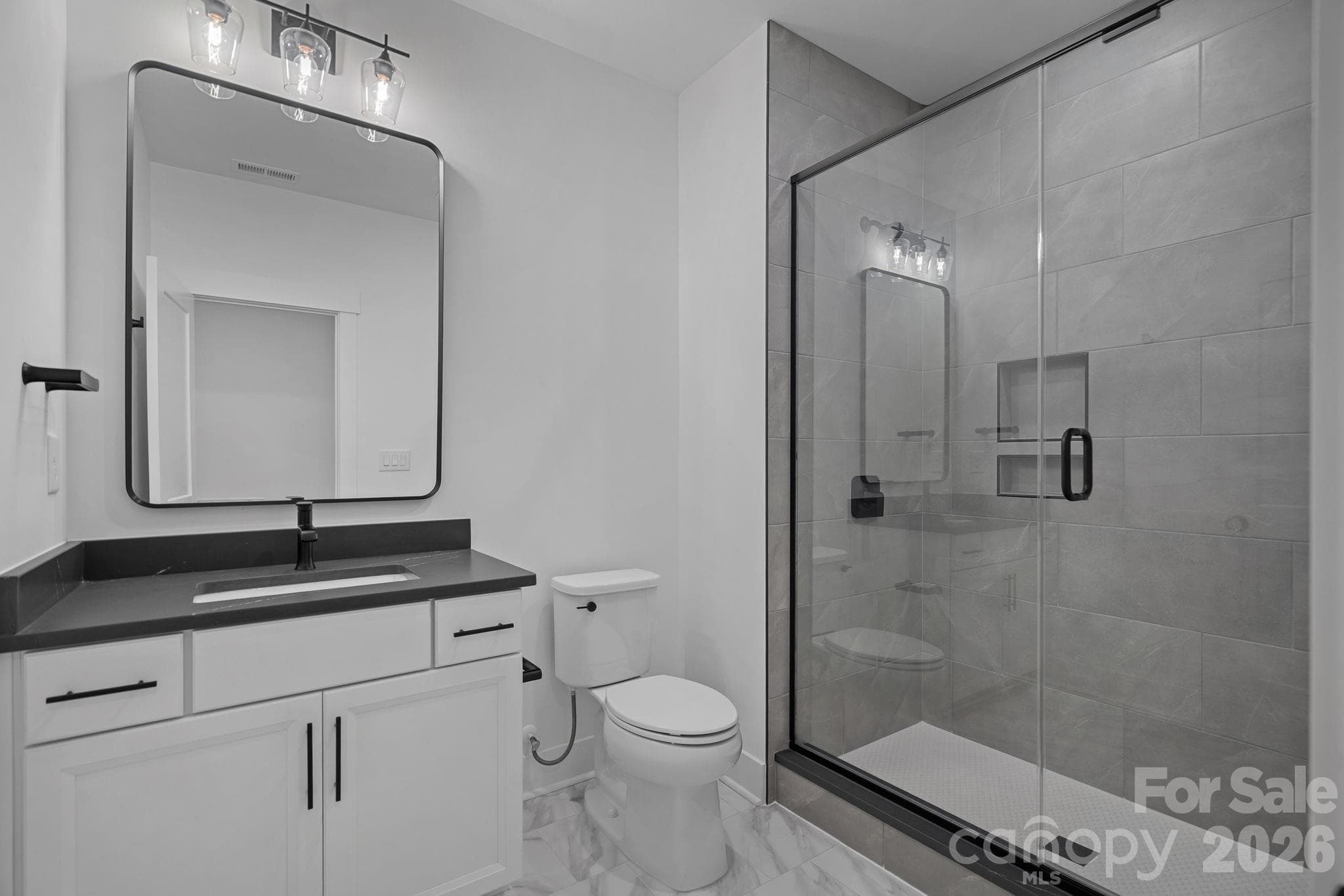 Basement Full Bathroom with walk-in Shower - 4477 Splash Trail, Sherrills Ford