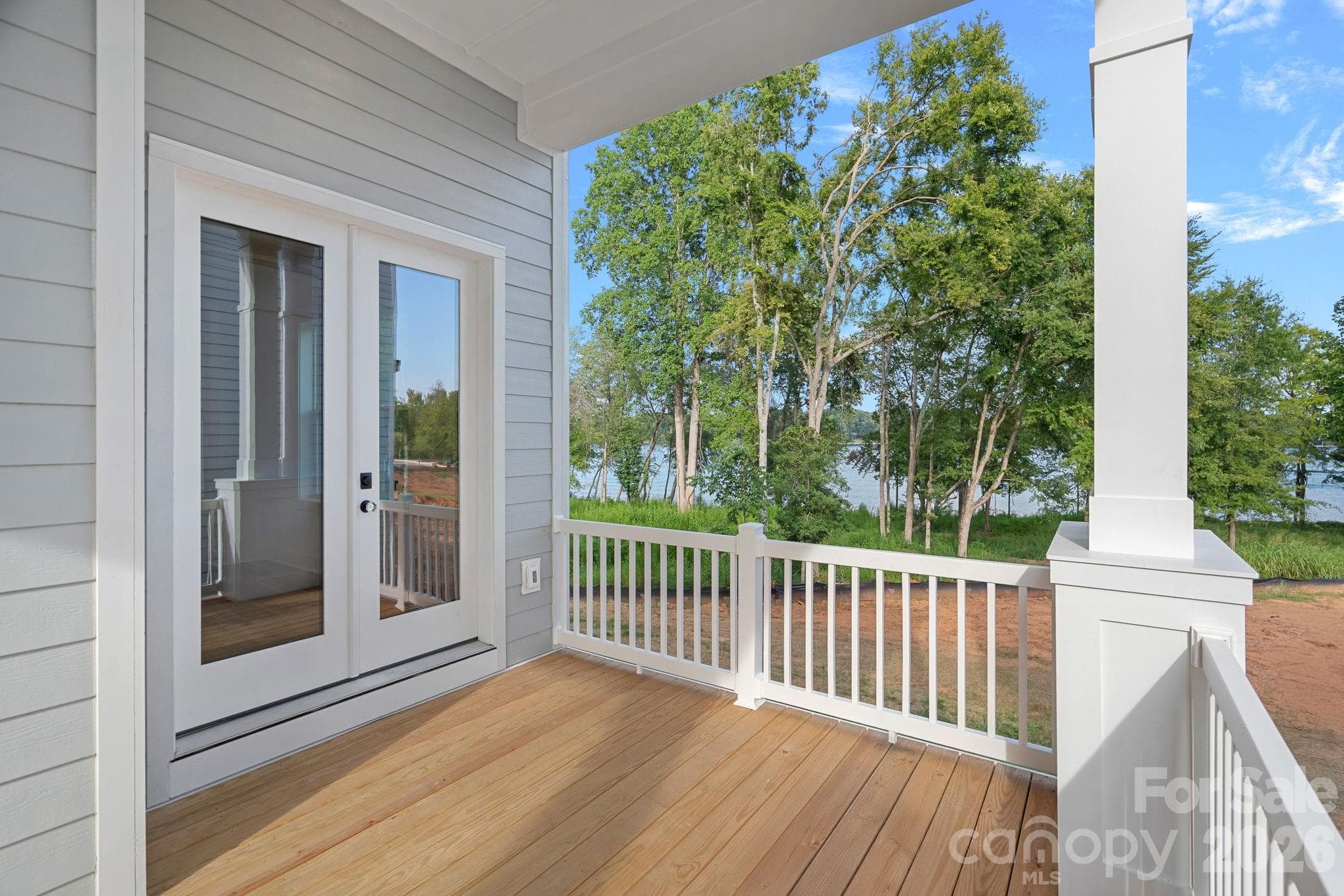 Side deck, access from the Gathering Room and the Primary Suite. - 4477 Splash Trail, Sherrills Ford