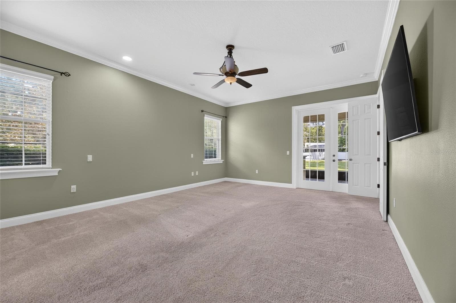 French doors leading out to Screened in Porch - 6408 WALKERS GLEN DR, LAKELAND