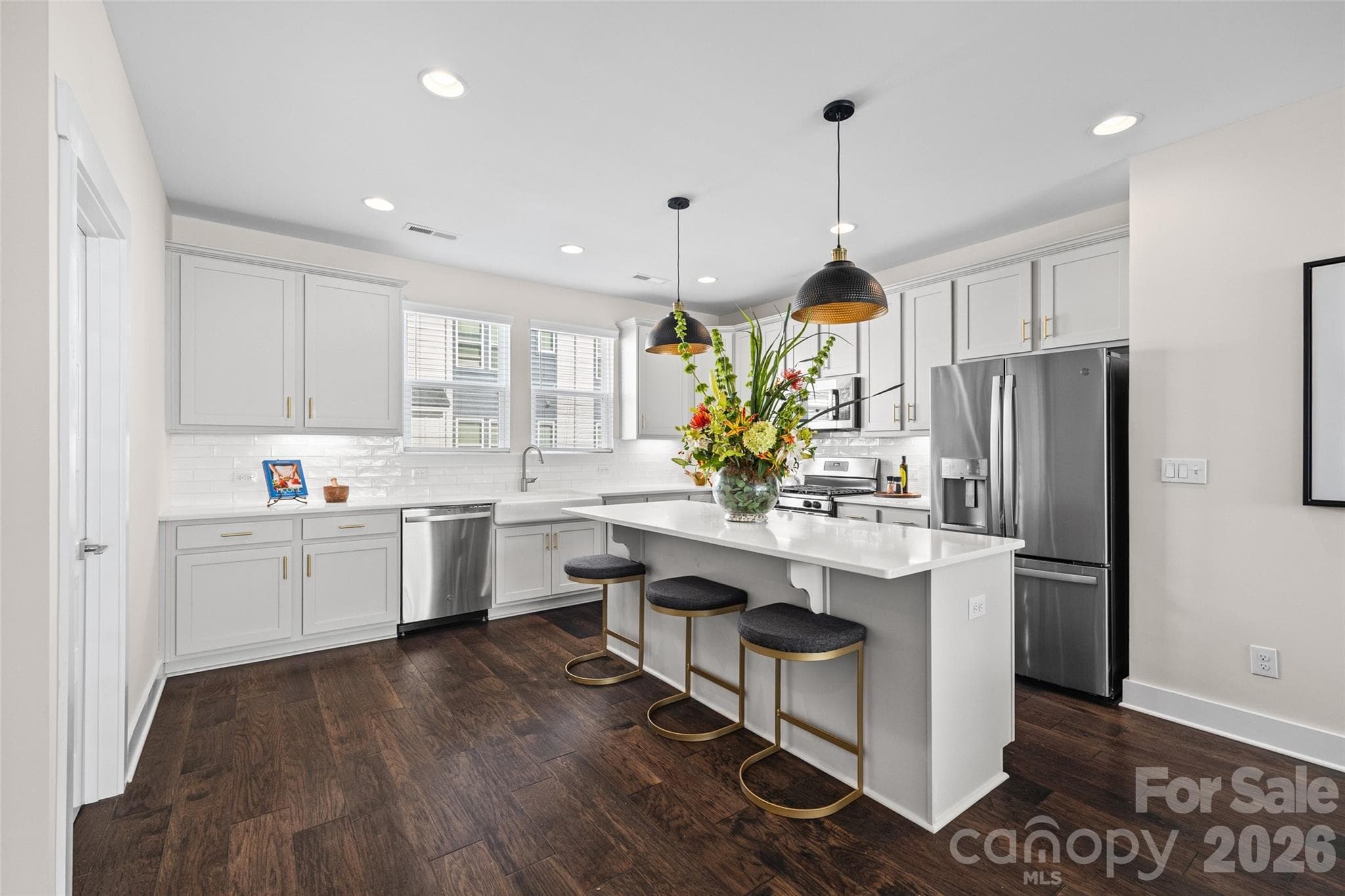 2nd FL: Open kitchen with island seating and generous counter space - 1229 Lomax Avenue, Charlotte