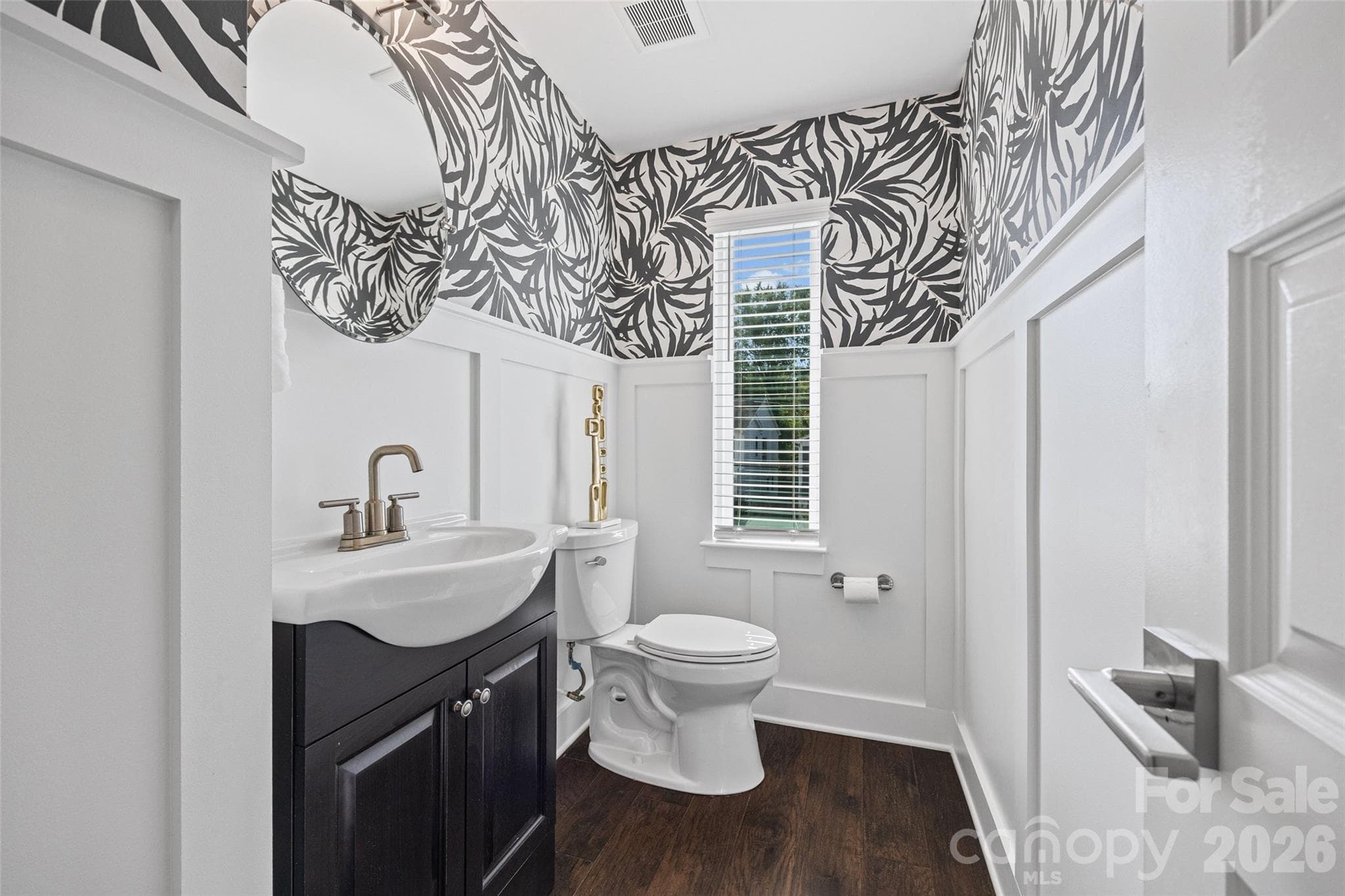 2nd FL: Powder Room with statement wallpaper and decorative paneling - 1229 Lomax Avenue, Charlotte