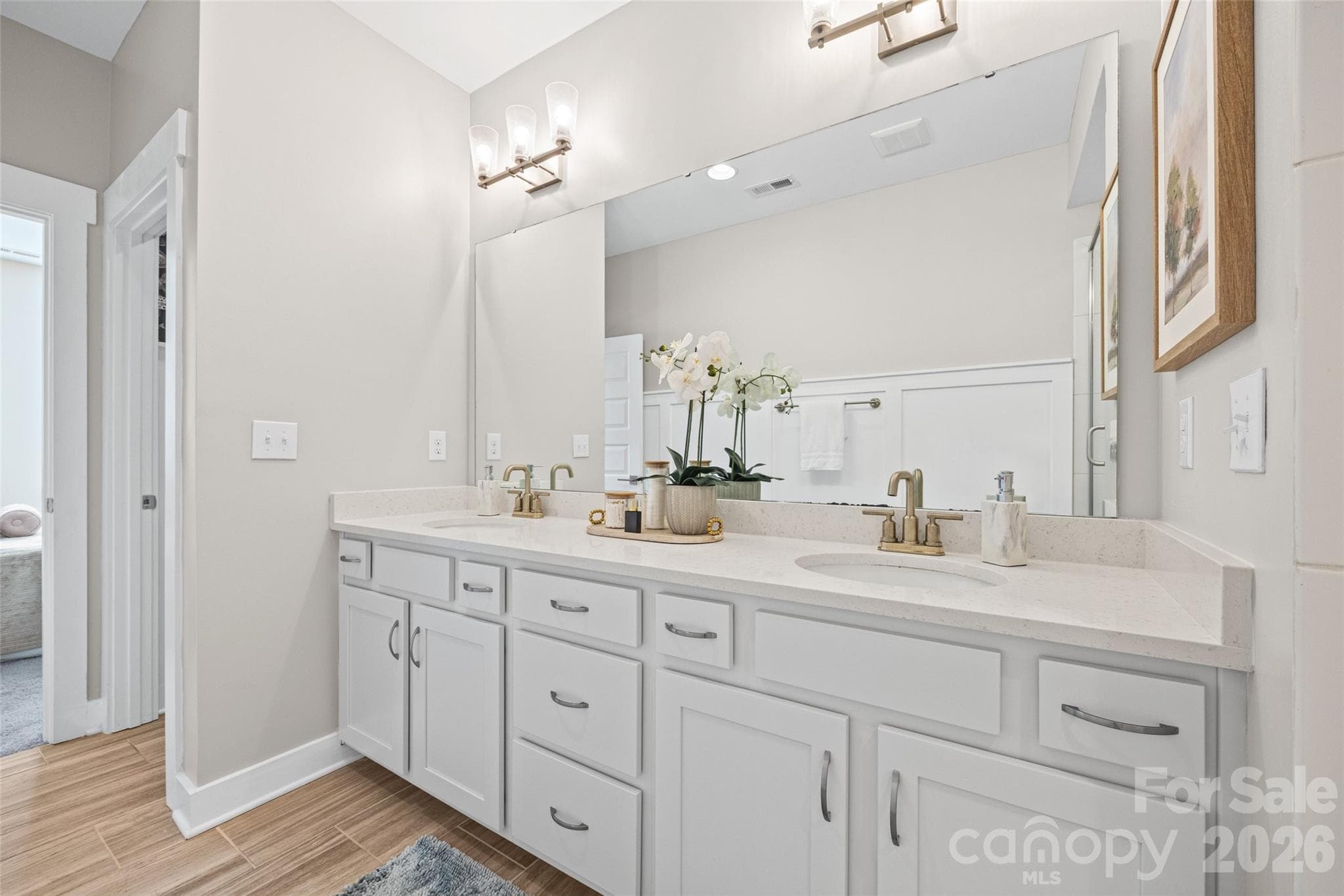 3rd FL: Primary en-suite bath with double sink vanity and seperate toilet room - 1229 Lomax Avenue, Charlotte
