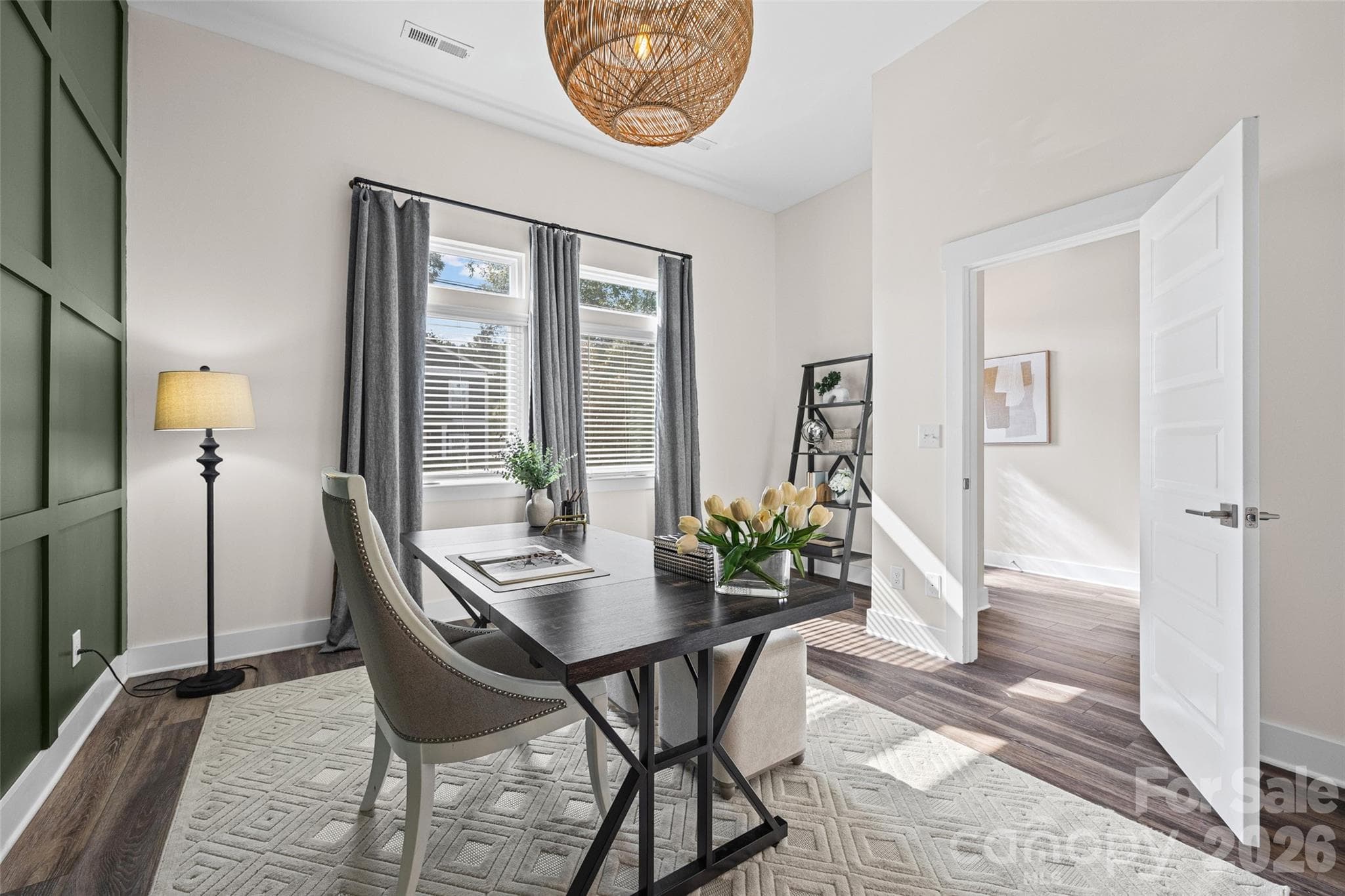 Flexible, entry-level bedroom / office with a rich green accent wall with en-suite - 1229 Lomax Avenue, Charlotte