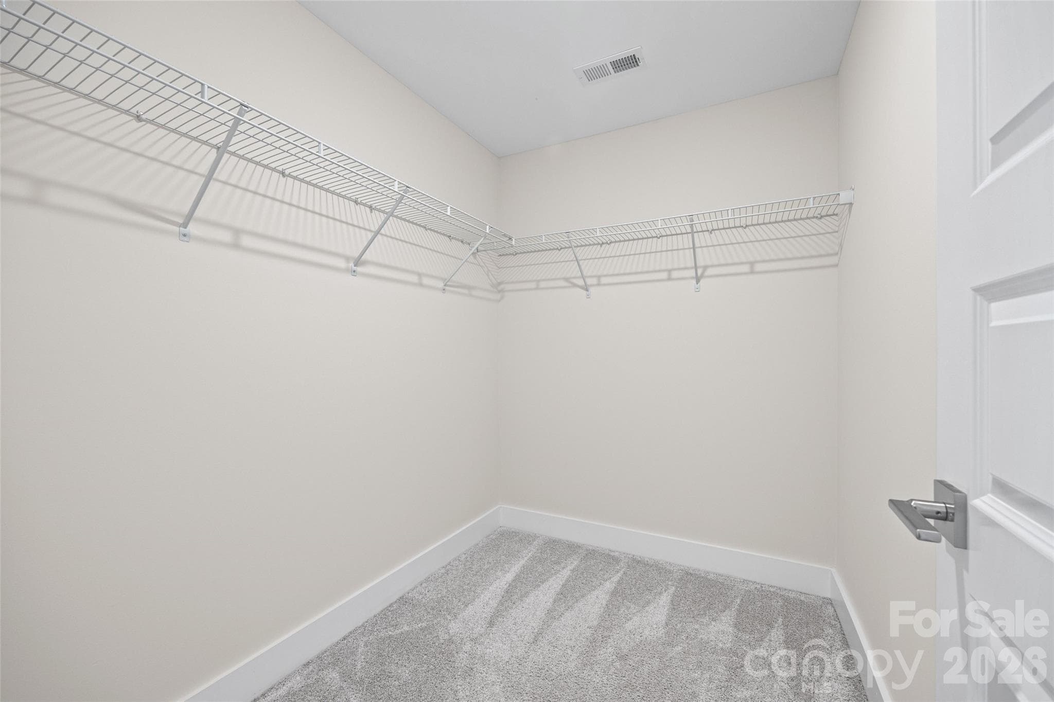 3rd FL: Bedroom walk-in closet with ample hanging space - 1229 Lomax Avenue, Charlotte