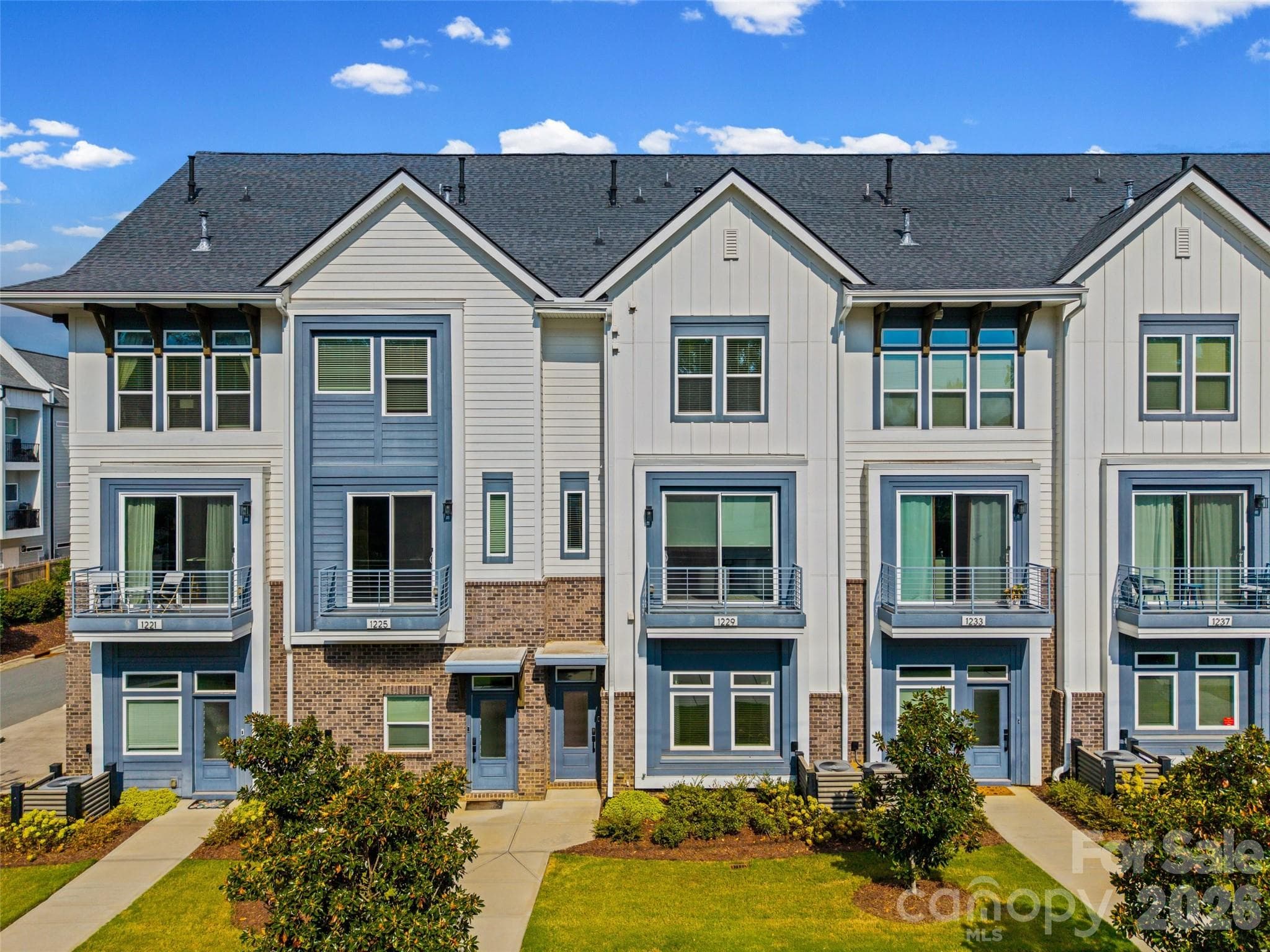 Front exterior of the four-story townhome - 1229 Lomax Avenue, Charlotte