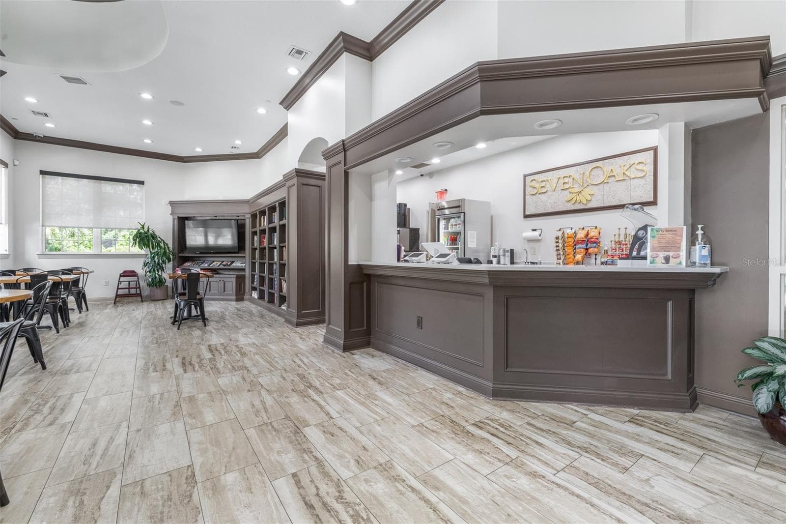 Clubhouse has a cafe and large gathering area - 27015 FIREBUSH DR, WESLEY CHAPEL