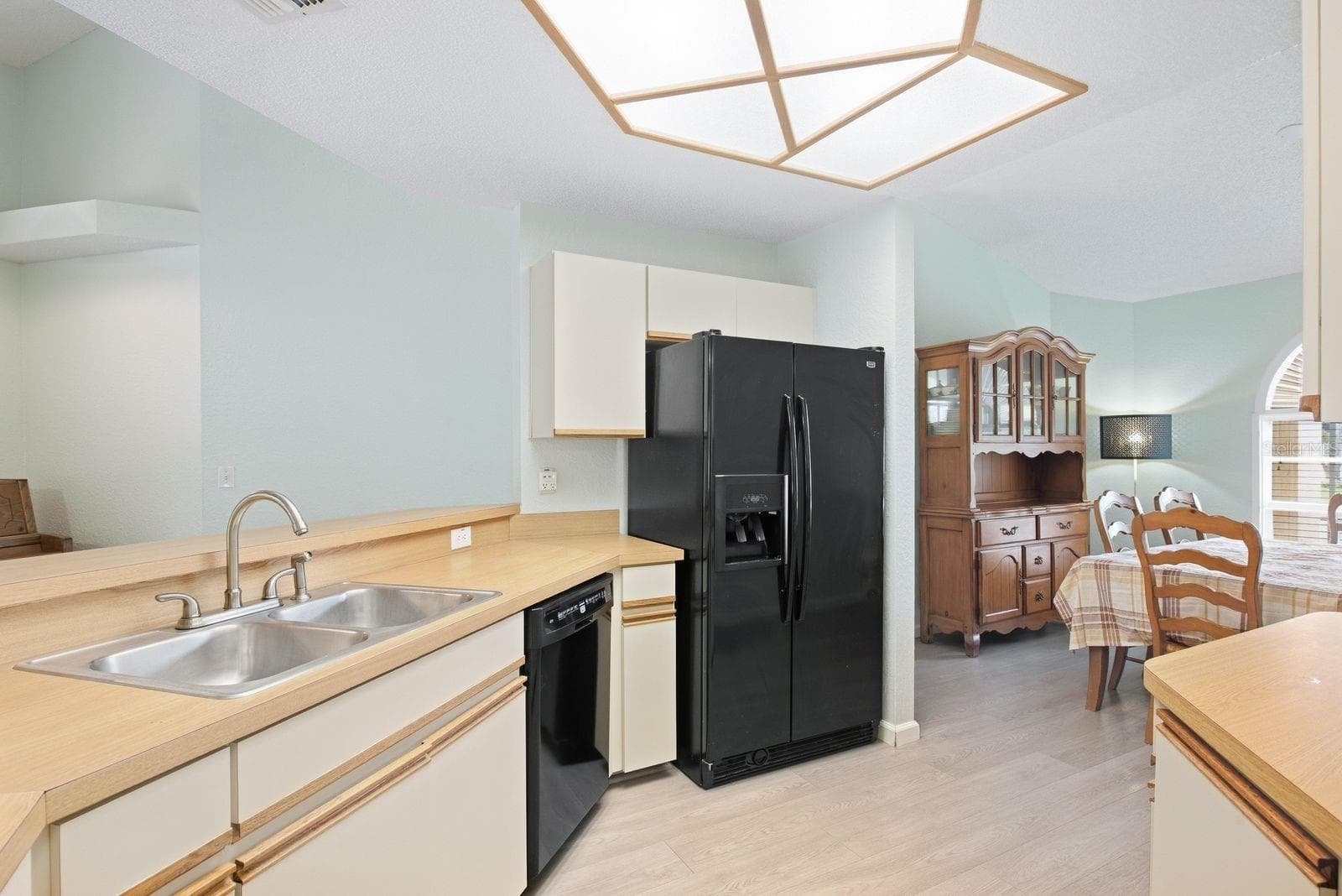 Stay connected to the living space while you cook. - 5955 107TH TER N, PINELLAS PARK