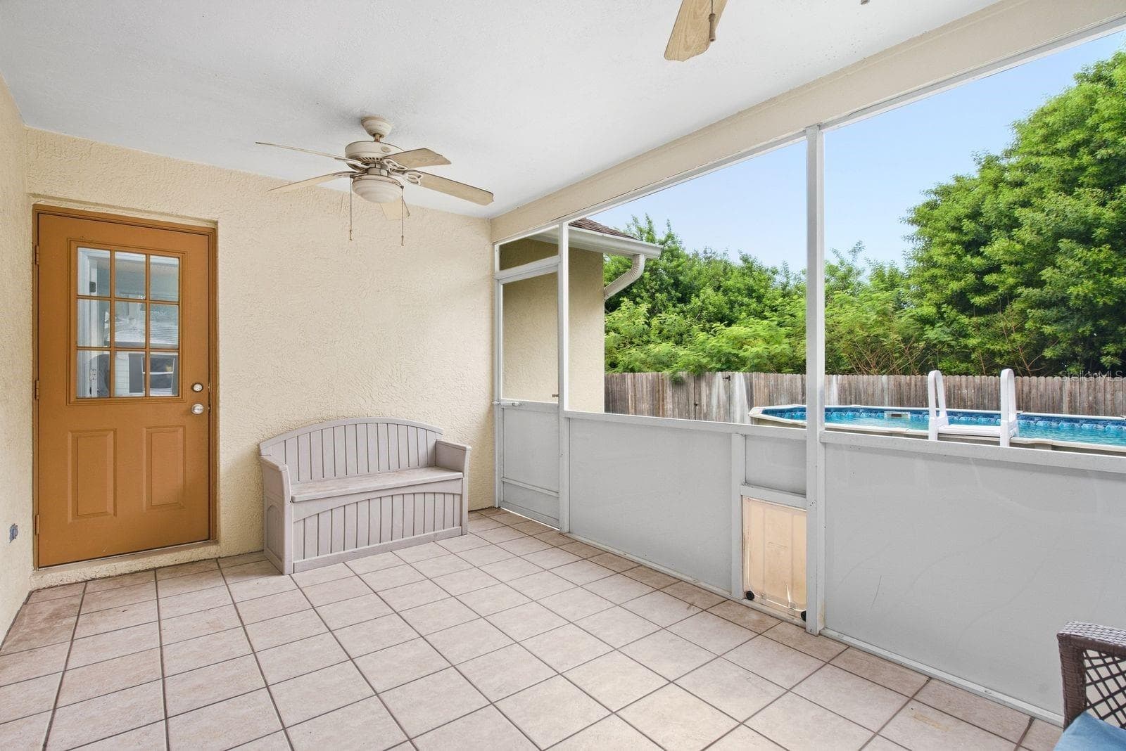 Back patio, leading to pool and backyard - 5955 107TH TER N, PINELLAS PARK