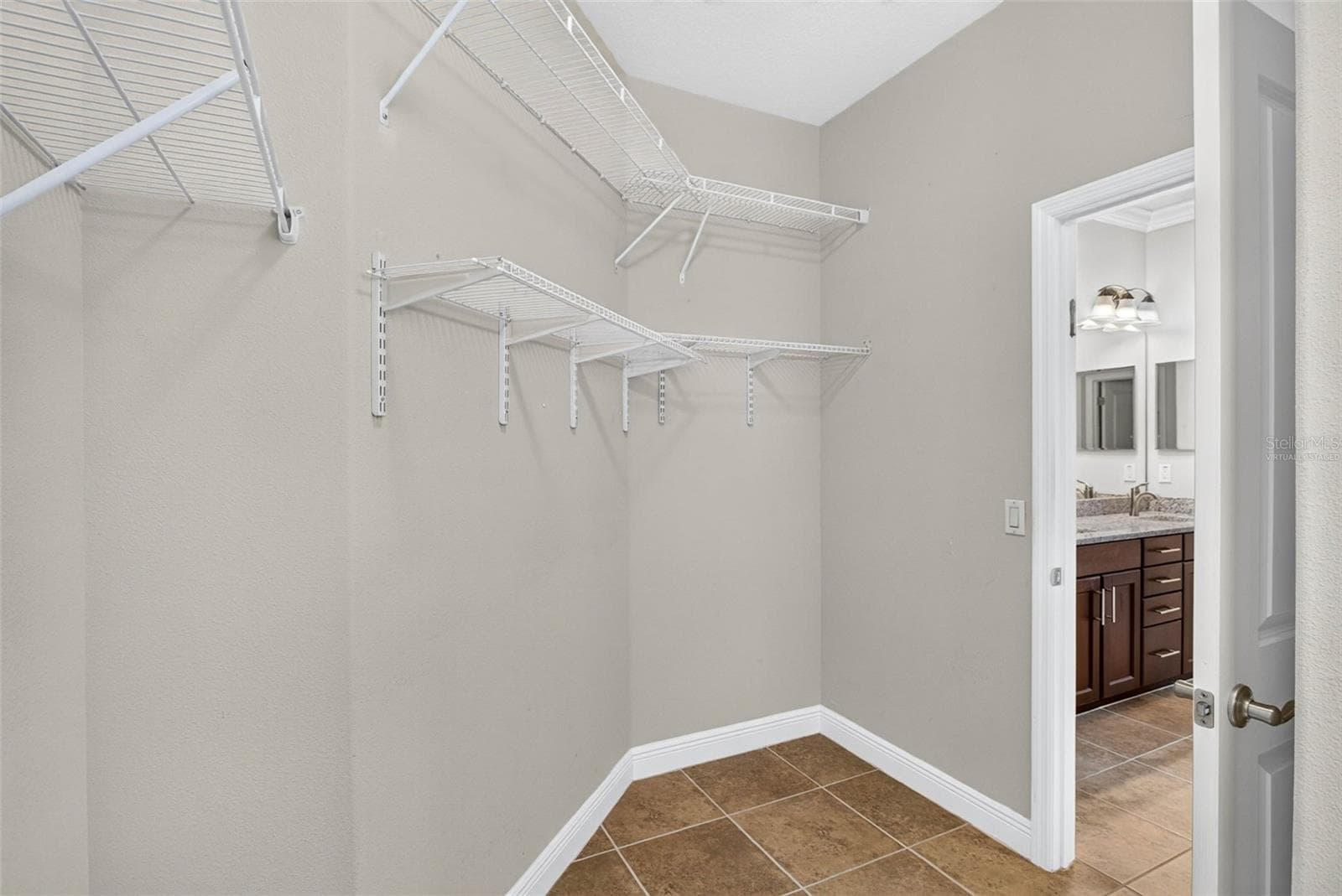 primary closet - 14619 ROCKY BROOK DR, TAMPA