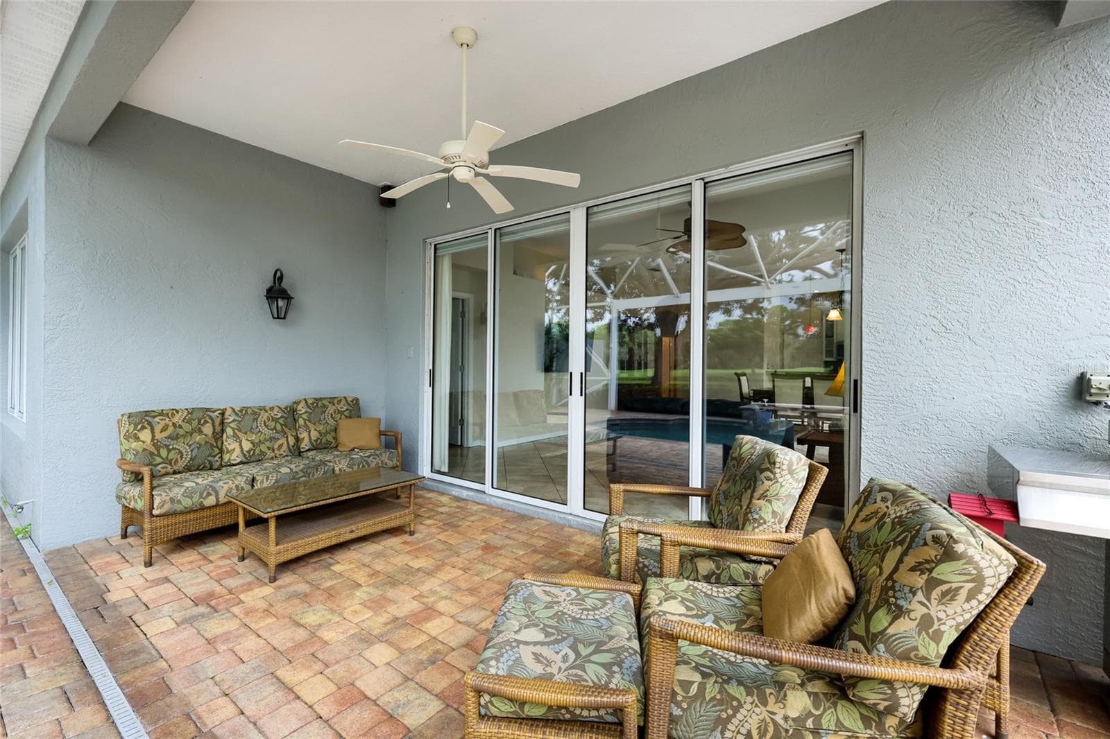 Covered lanai space with gas line hookup for grill or an eventual outdoor kitchen - 8728 52ND DR E, BRADENTON