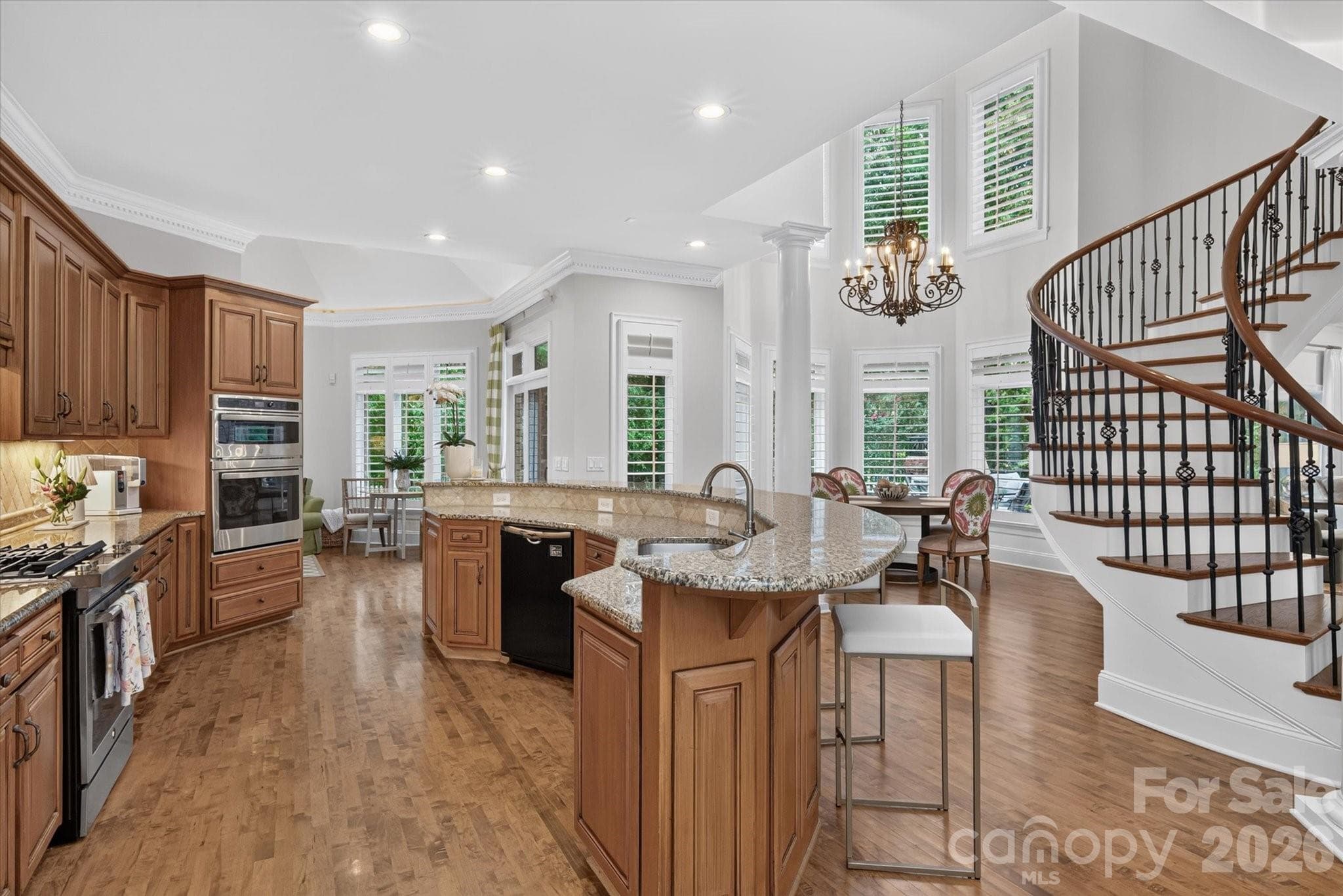 Chef's kitchen is wide open for easy entertaining - 1005 Firethorne Club Drive, Marvin
