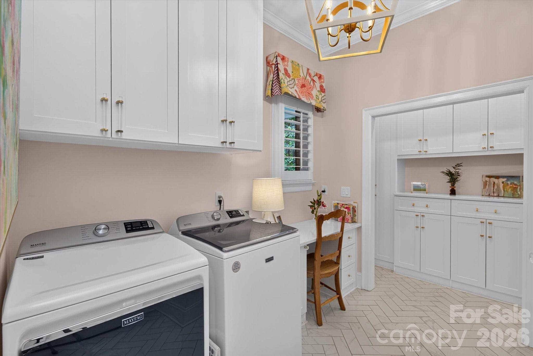 Updated laundry room with custom built-ins and work space - 1005 Firethorne Club Drive, Marvin