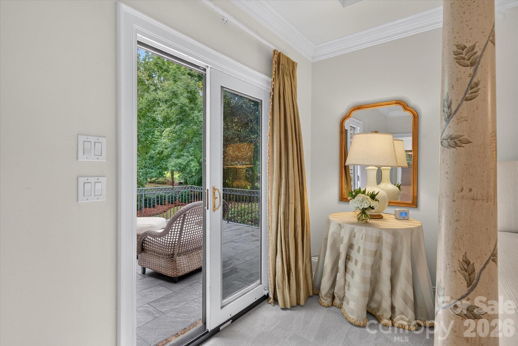 Walk-out terrace off primary bedroom - 1005 Firethorne Club Drive, Marvin