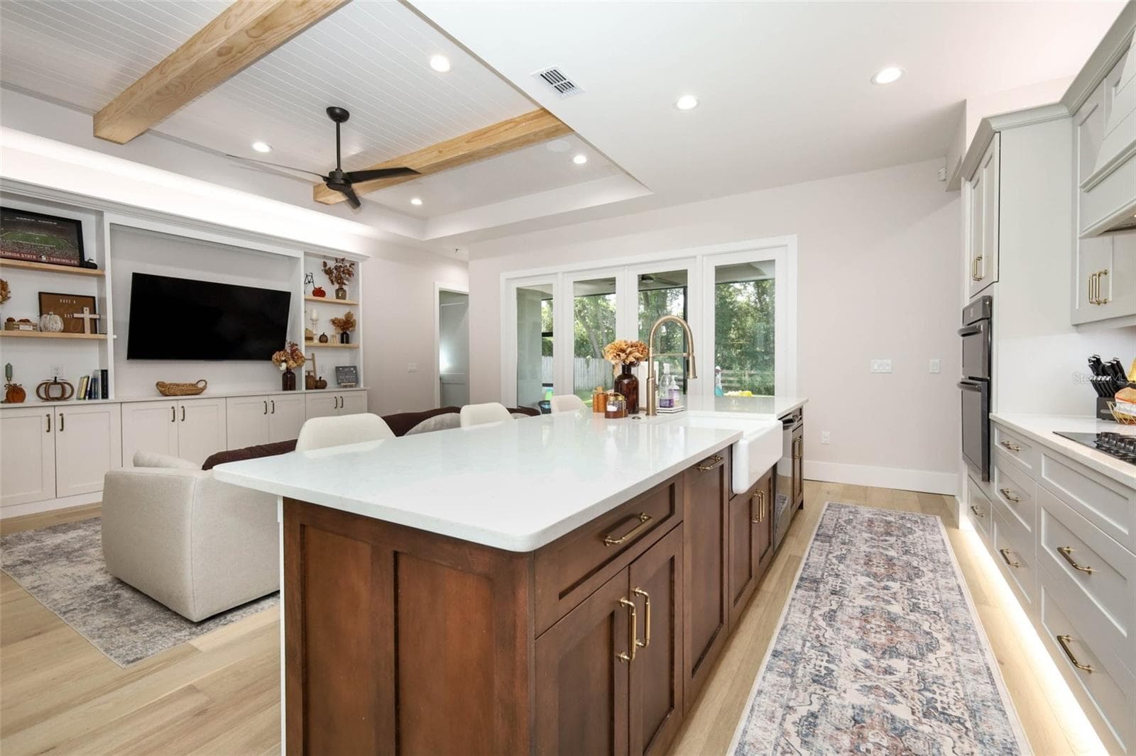 View of kitchen island equipped with quartz countertops and gold accents - 175 PINE ST, GENEVA