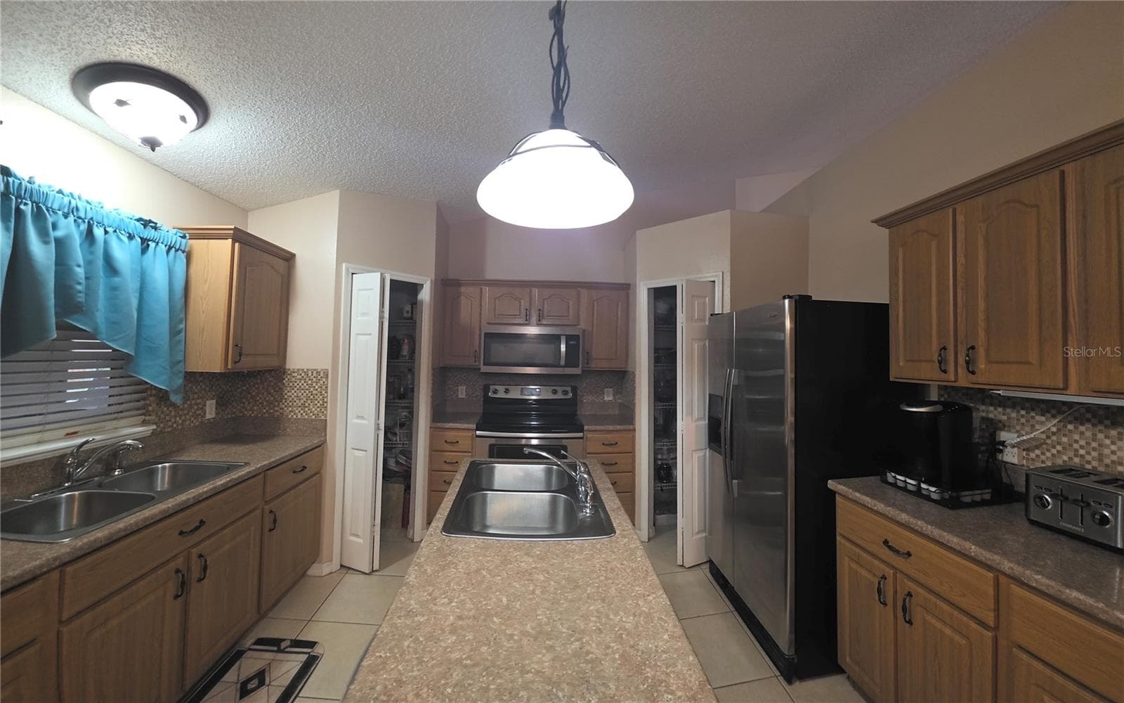 Kitchen 2 pantries - 3154 SNOW DR, DELTONA