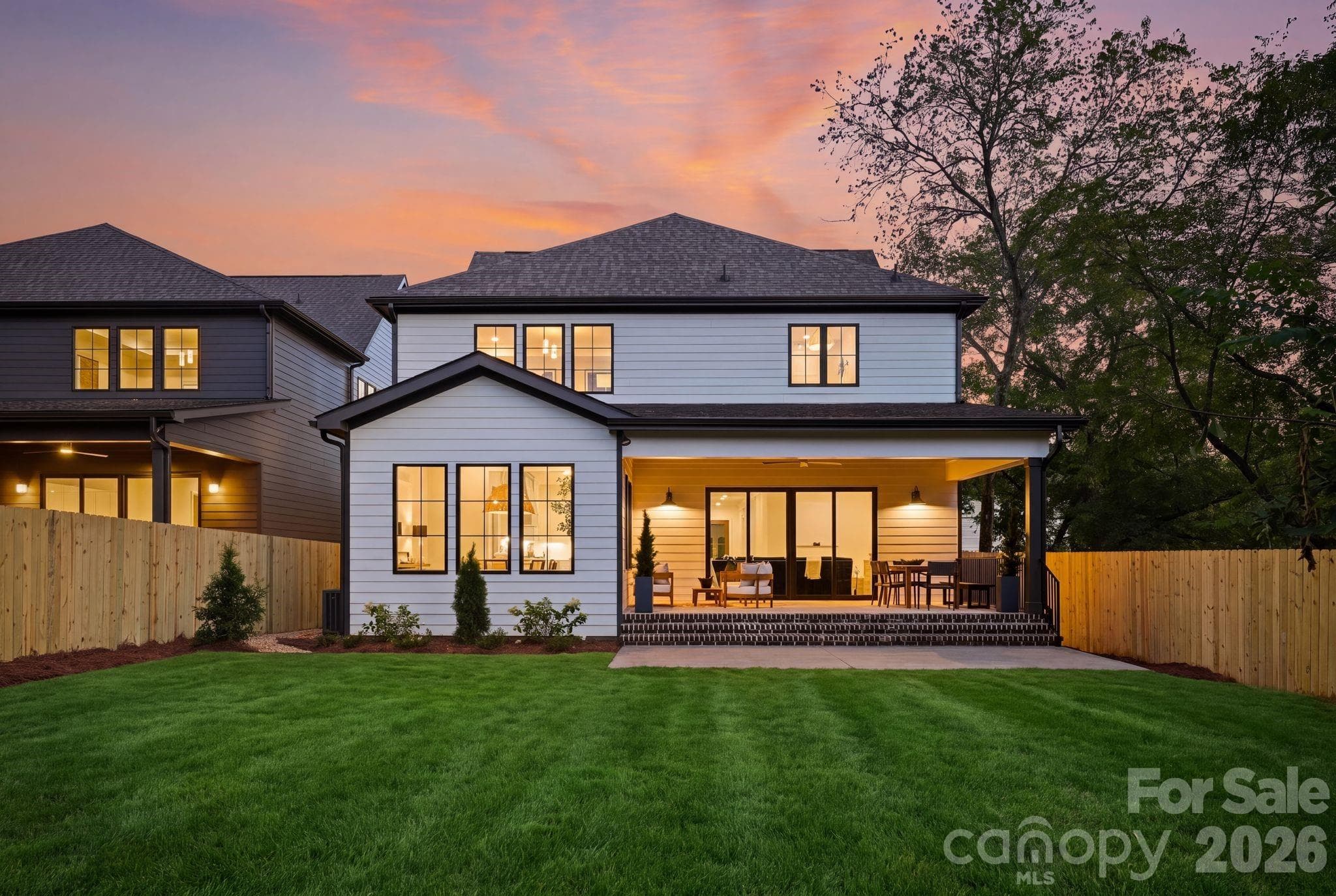 Front exterior at twilight - 1115 Lomax Avenue, Charlotte
