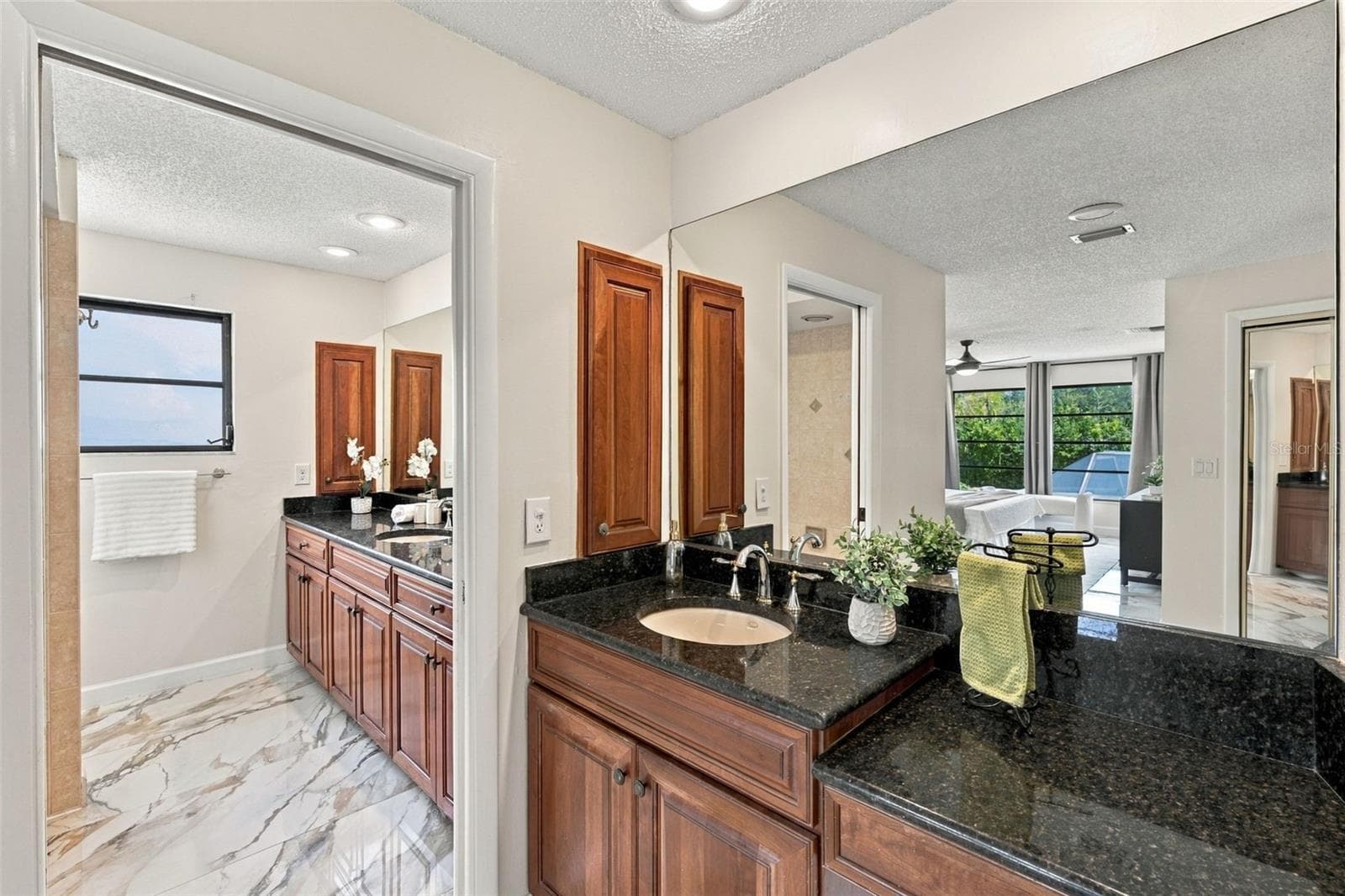 Primary Bath Double Sinks and Vanity - 2924 TORREY PINES CT, CLEARWATER