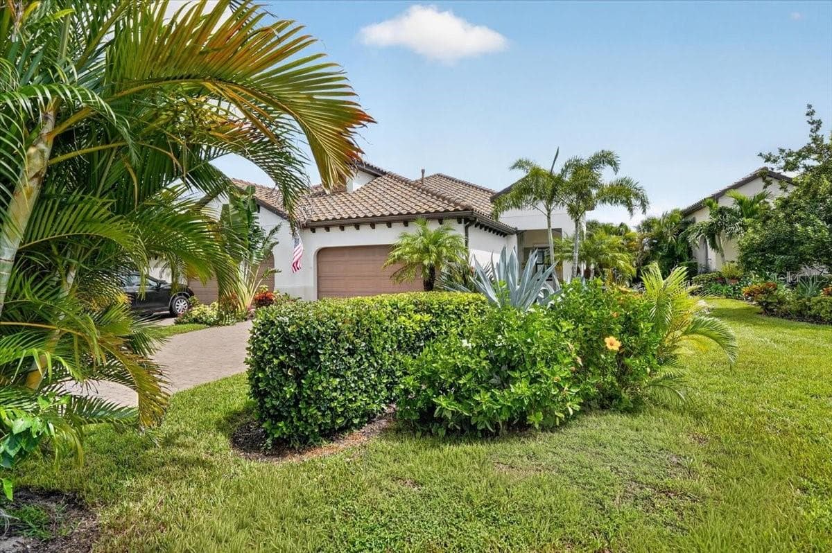 Front of House with Custom Plantings - 11241 MCDERMOTT CT, ENGLEWOOD