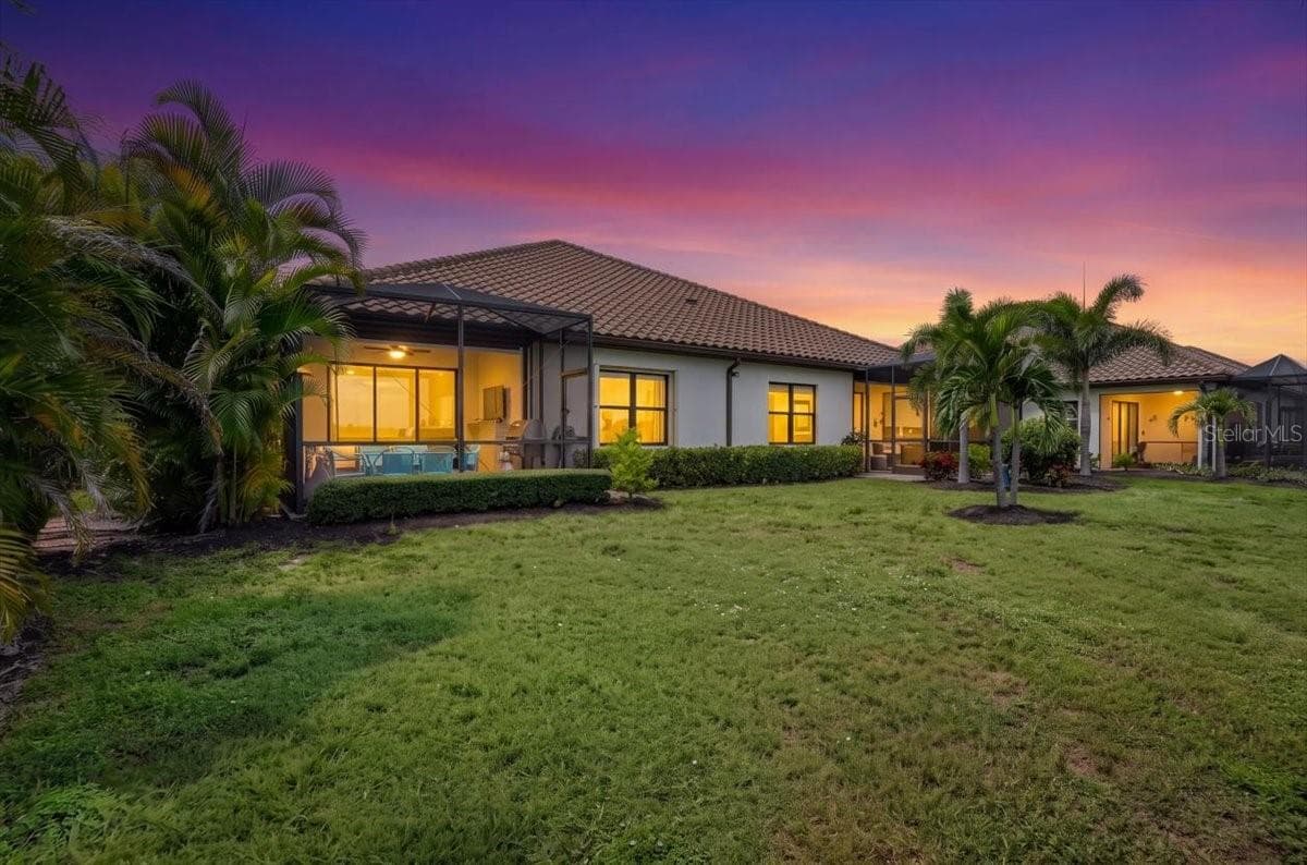 Back of House at Twilight - 11241 MCDERMOTT CT, ENGLEWOOD