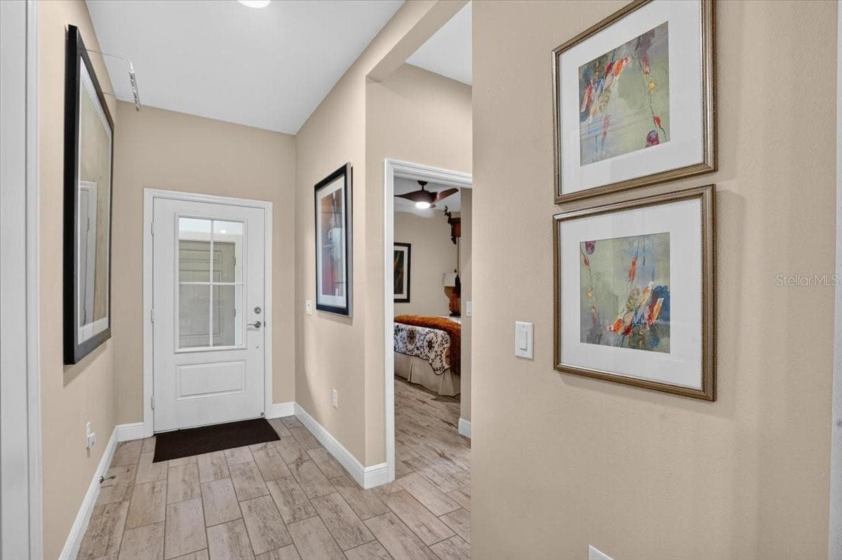 Foyer to the Front Door - 11241 MCDERMOTT CT, ENGLEWOOD