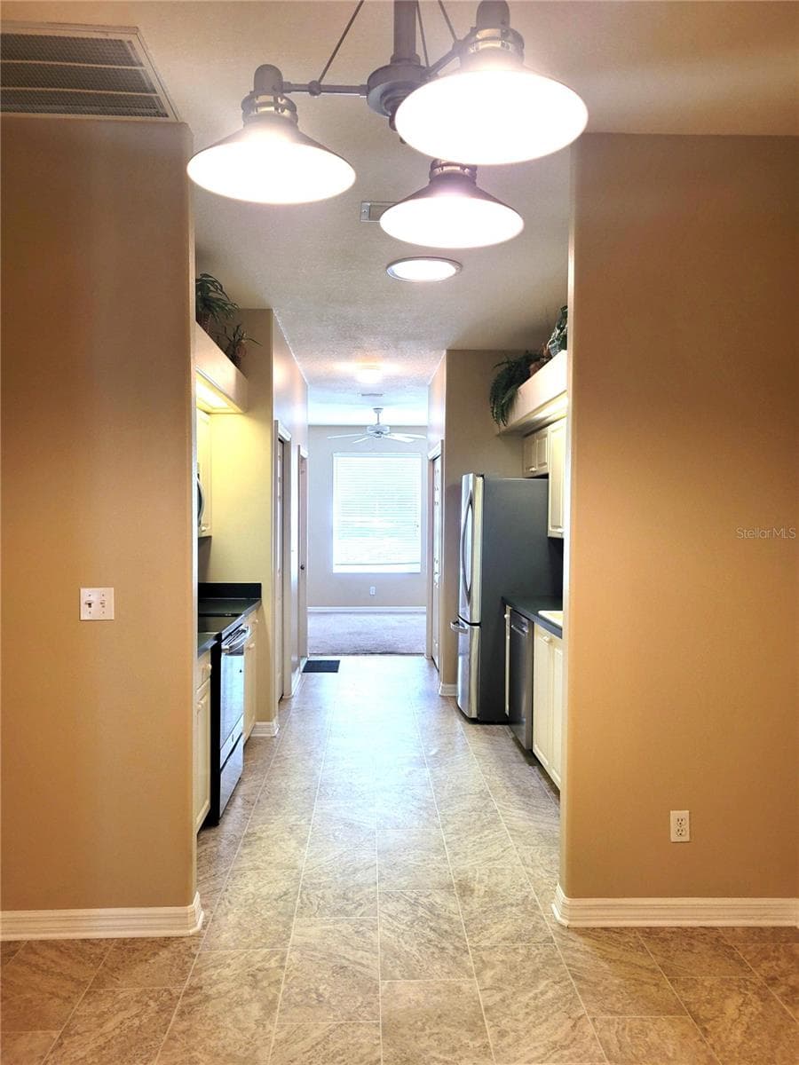 Kitchen from Dining Room - 4343 LAKESHORE DR, PALM HARBOR