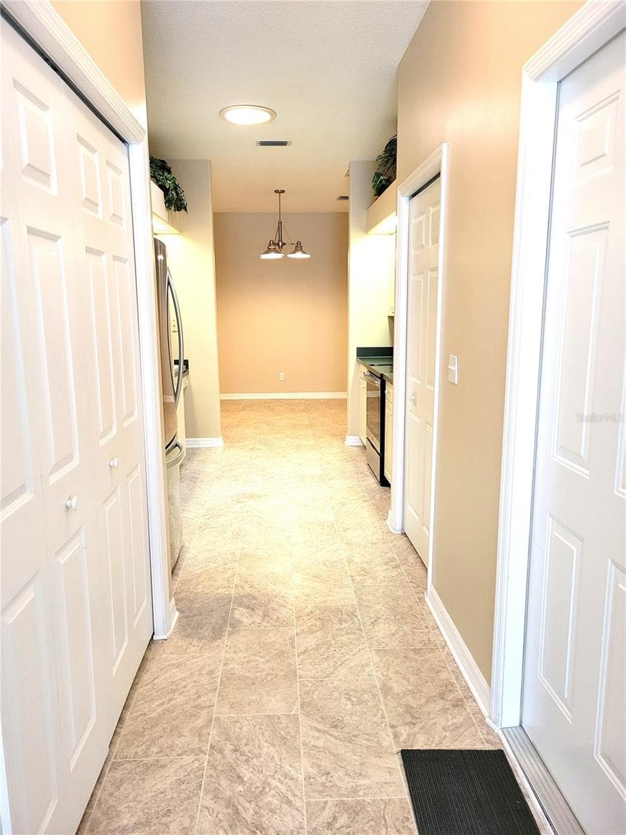 Office Hallway to Kitchen/Garage - 4343 LAKESHORE DR, PALM HARBOR