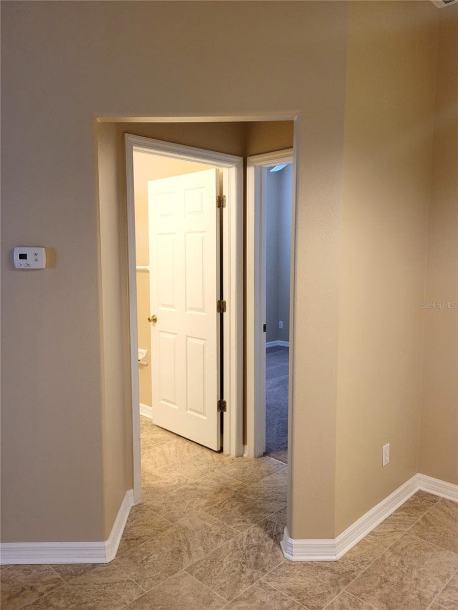 Entry to 2nd Bedroom/Bath - 4343 LAKESHORE DR, PALM HARBOR