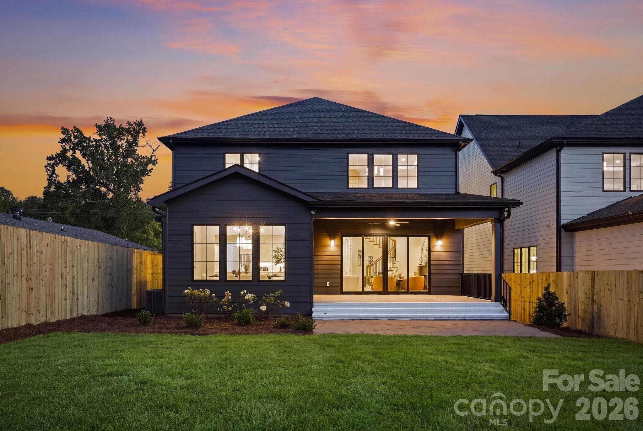 Rear exterior at twilight - 1117 Lomax Avenue, Charlotte