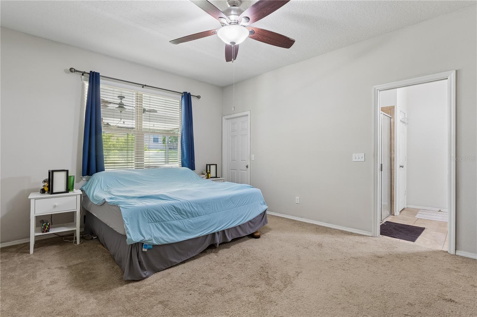 Primary bedroom with en-suite bath - 30022 DONNINGTON LOOP, MOUNT DORA