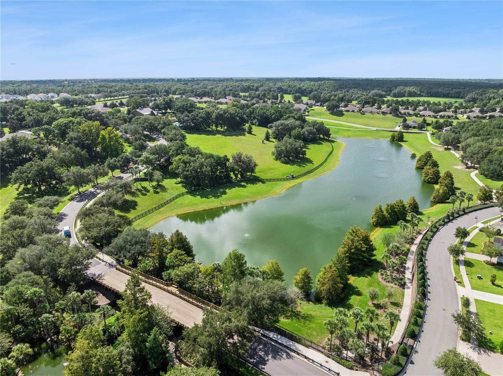 Majestic entry into Sullivan Ranch and the bridge over the waterway. - 30022 DONNINGTON LOOP, MOUNT DORA