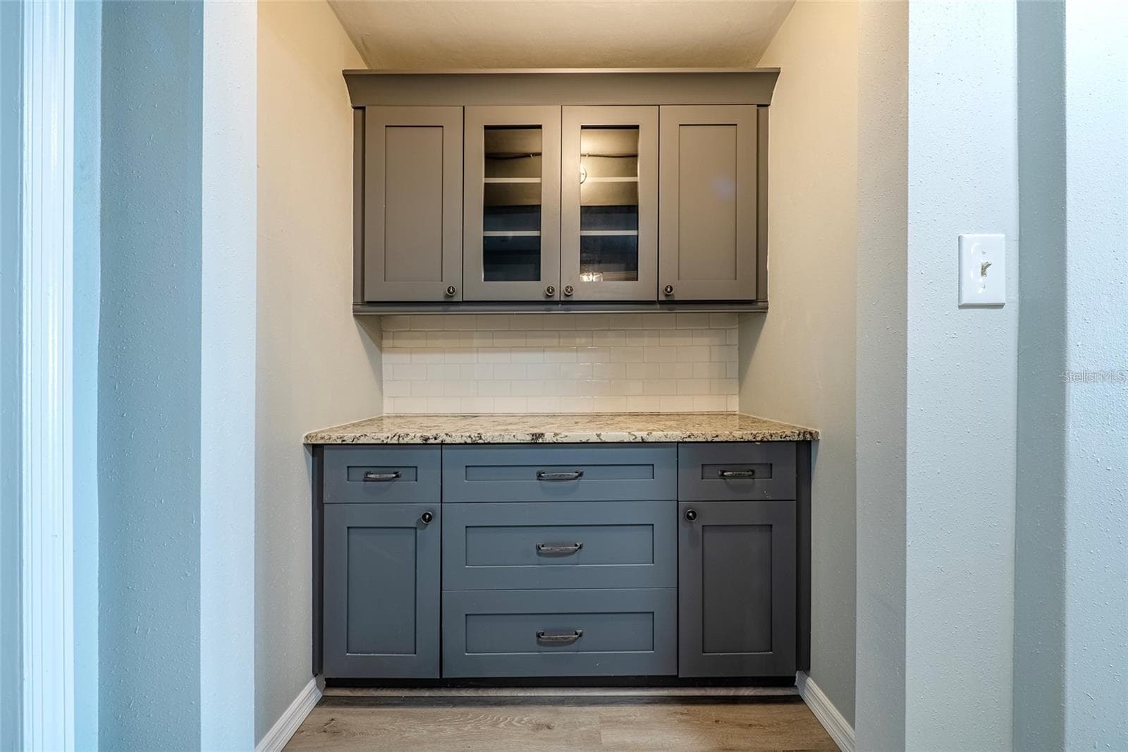 Built in coffee bar/wine bar/pantry next to kitchen - 620 EDGEWATER DR #103, DUNEDIN