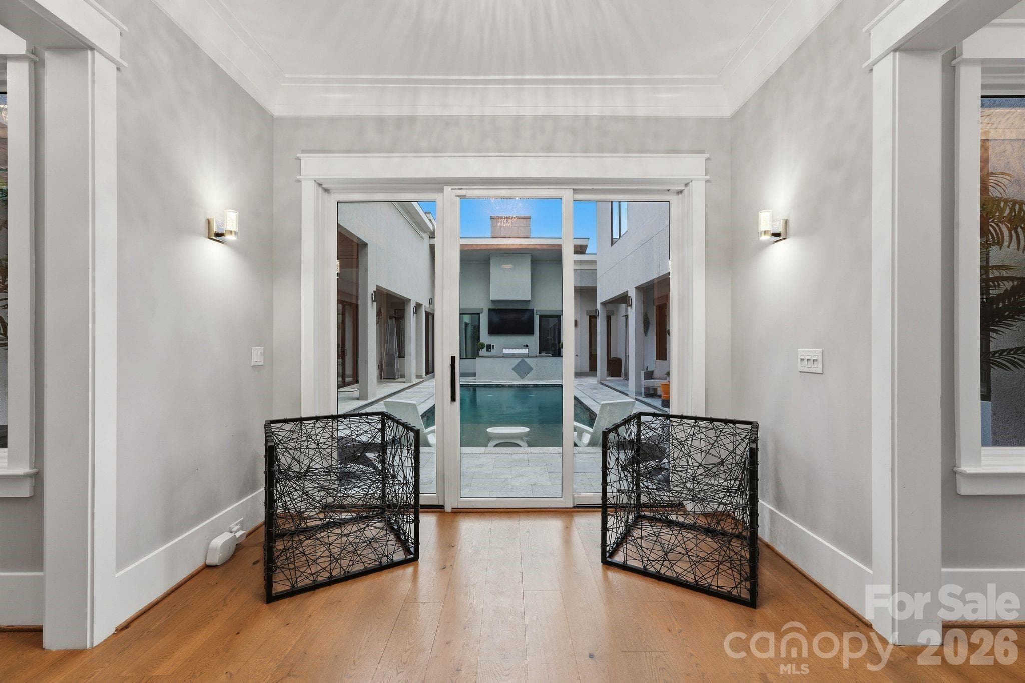 Master Bedroom Suite with Private One-Way Mirror Glass Overlooking the Private Quart Yard Pool and Terrace - 15700 Youngblood Road, Charlotte