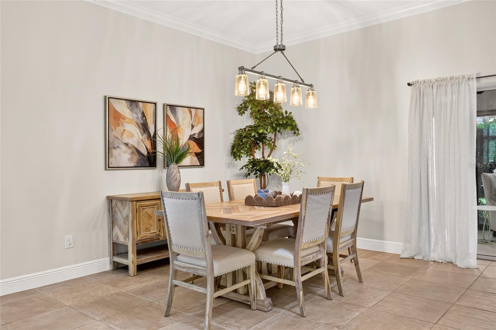 Spacious Dining Room with Crown Molding - 2084 NORDIC LN, THE VILLAGES