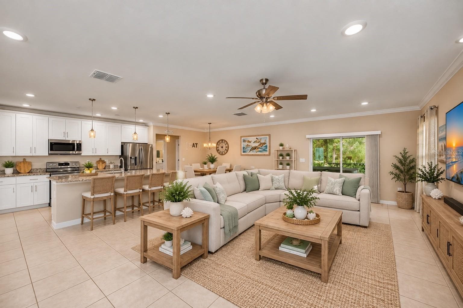 Virtually Staged Spacious Open-Concept Great Room with Seamless Kitchen Integration. - 640 ENCARNACION ST, PUNTA GORDA