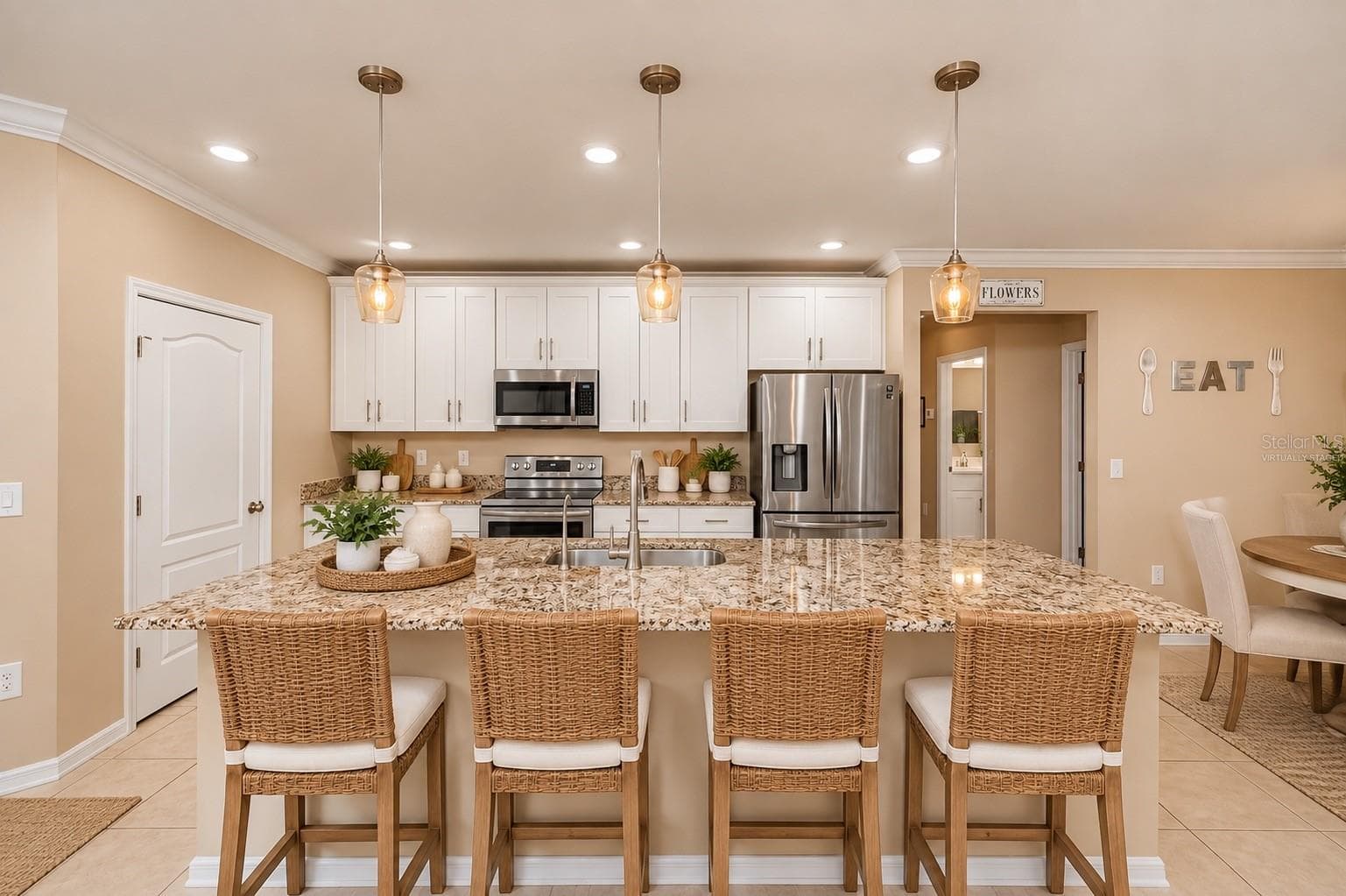 Virtually Staged Granite Island and Walk-In Pantry. - 640 ENCARNACION ST, PUNTA GORDA