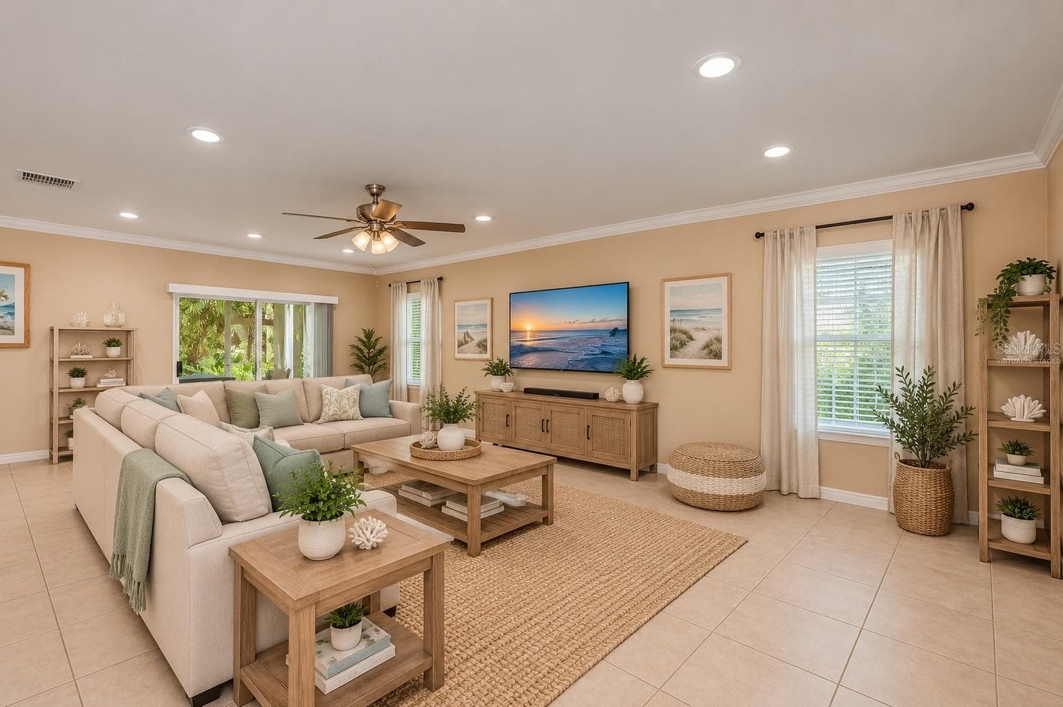 Virtually Staged Spacious Living Room with Crown Molding and Lanai Access. - 640 ENCARNACION ST, PUNTA GORDA