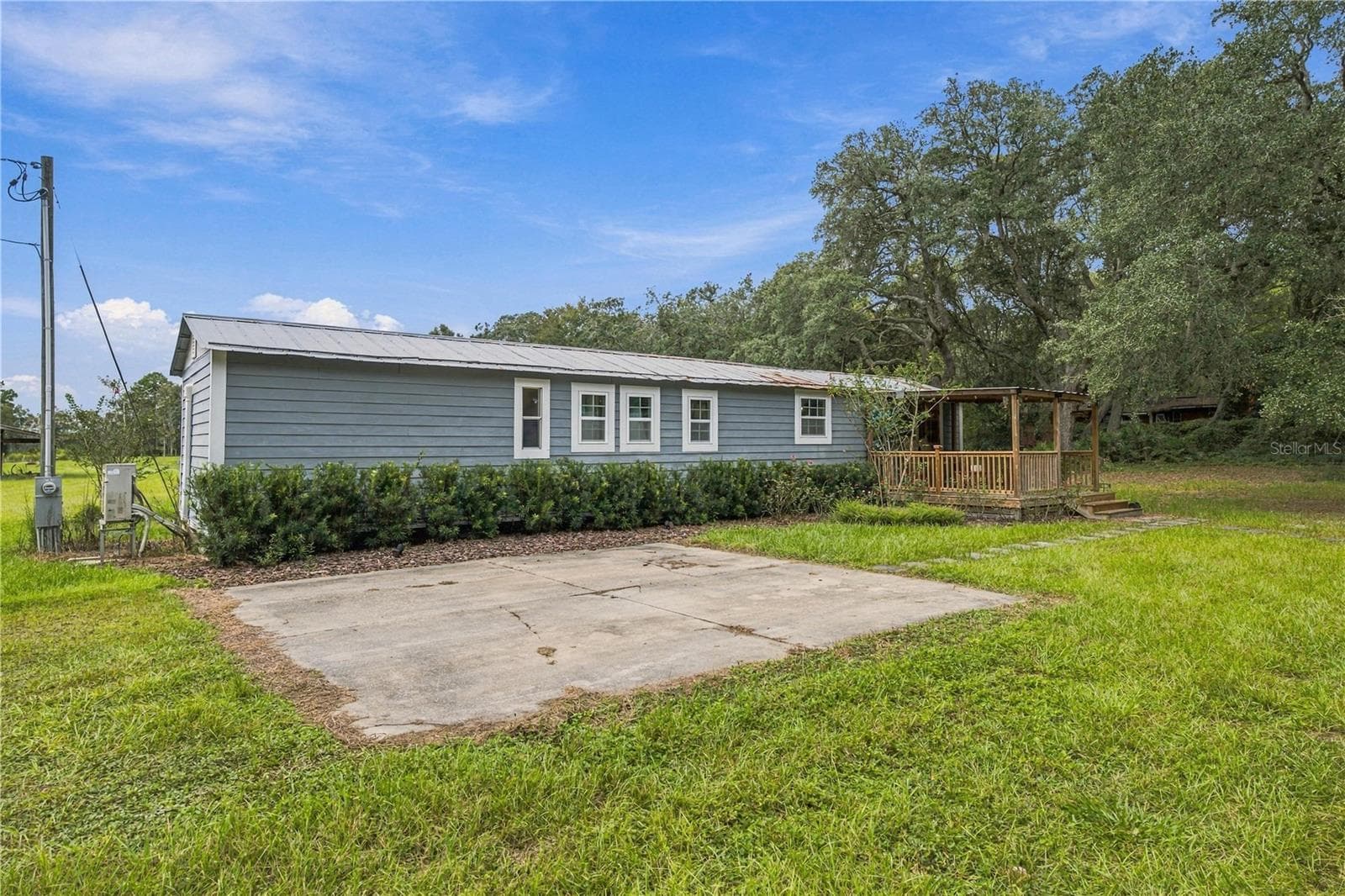Manufactured Home at 14468 NE 150TH AVE, FORT MC COY, photo 3 of 51