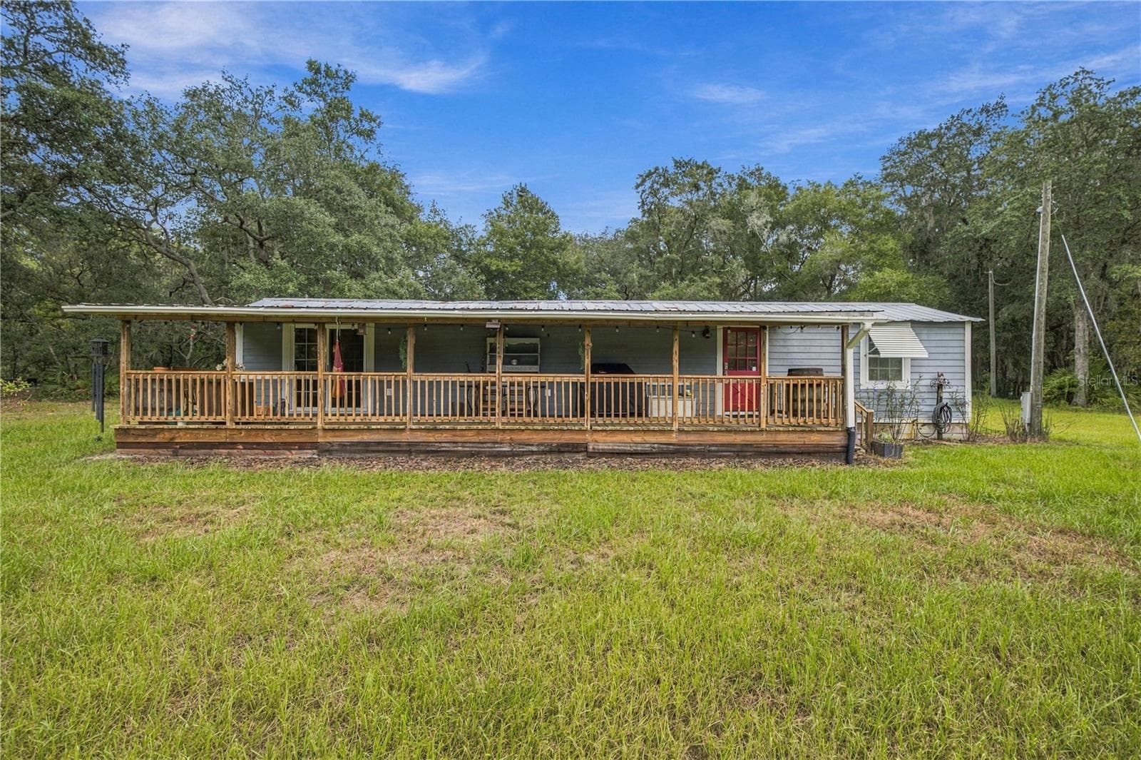 Manufactured Home at 14468 NE 150TH AVE, FORT MC COY, photo 5 of 51