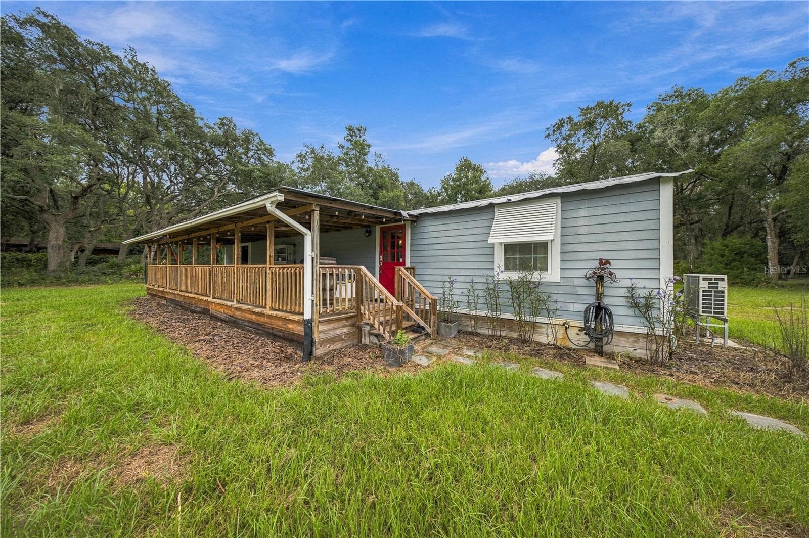 Manufactured Home at 14468 NE 150TH AVE, FORT MC COY, photo 6 of 51