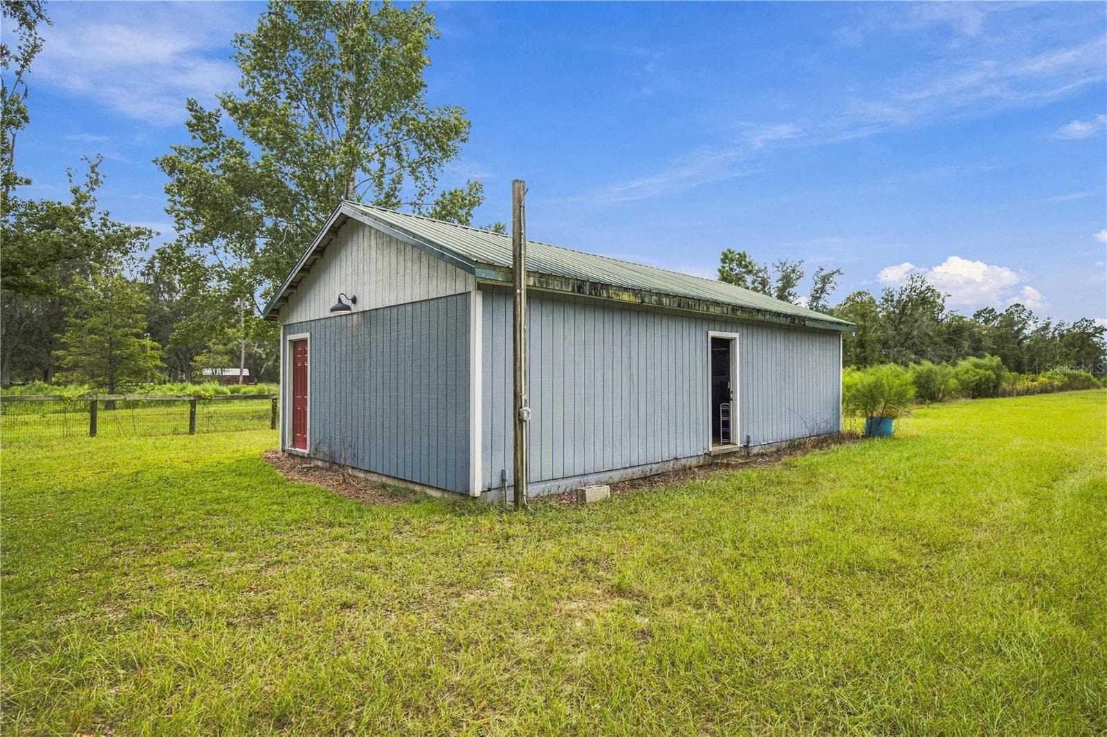Manufactured Home at 14468 NE 150TH AVE, FORT MC COY, photo 7 of 51