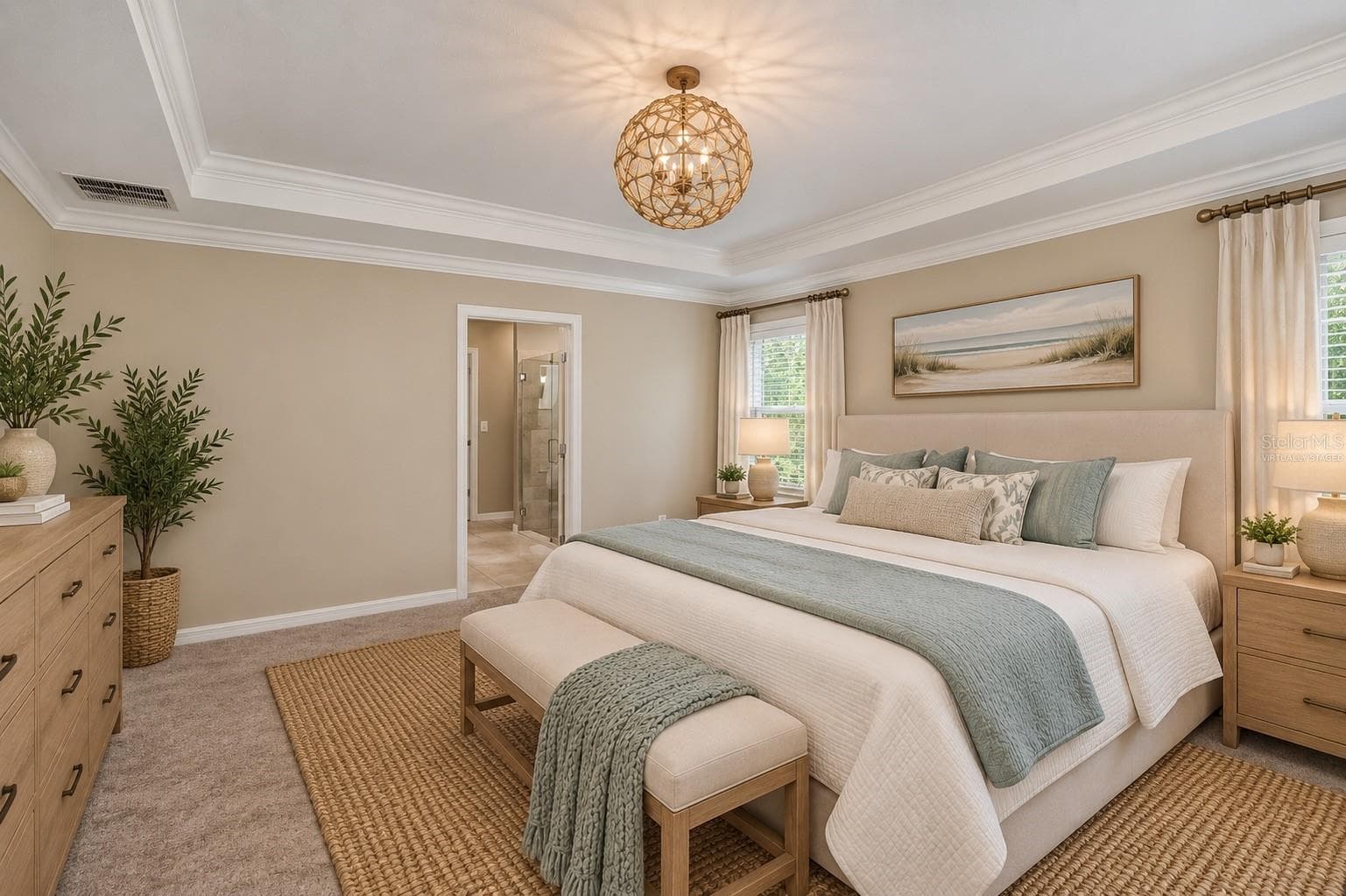 Virtually Staged Luxurious Primary Suite with Tray Ceiling, Crown Molding & Designer Lighting. - 640 ENCARNACION ST, PUNTA GORDA