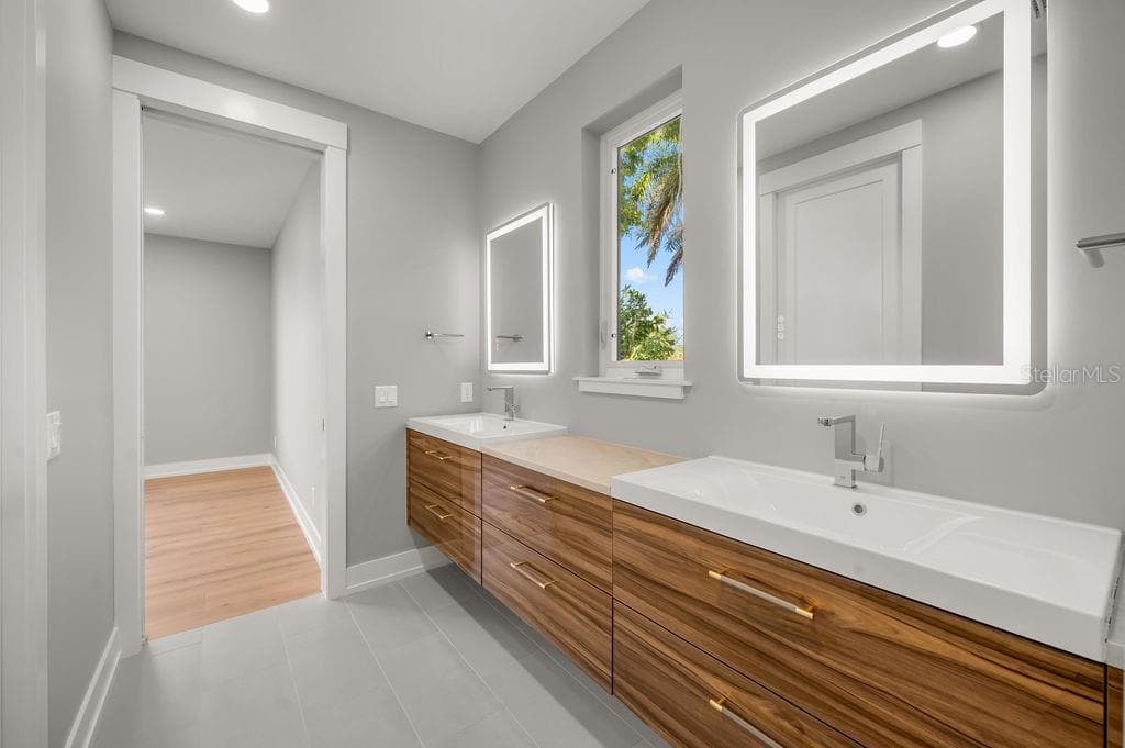 Another view of Jack/Jill full bathroom. - 3360 BAYOU SOUND, LONGBOAT KEY