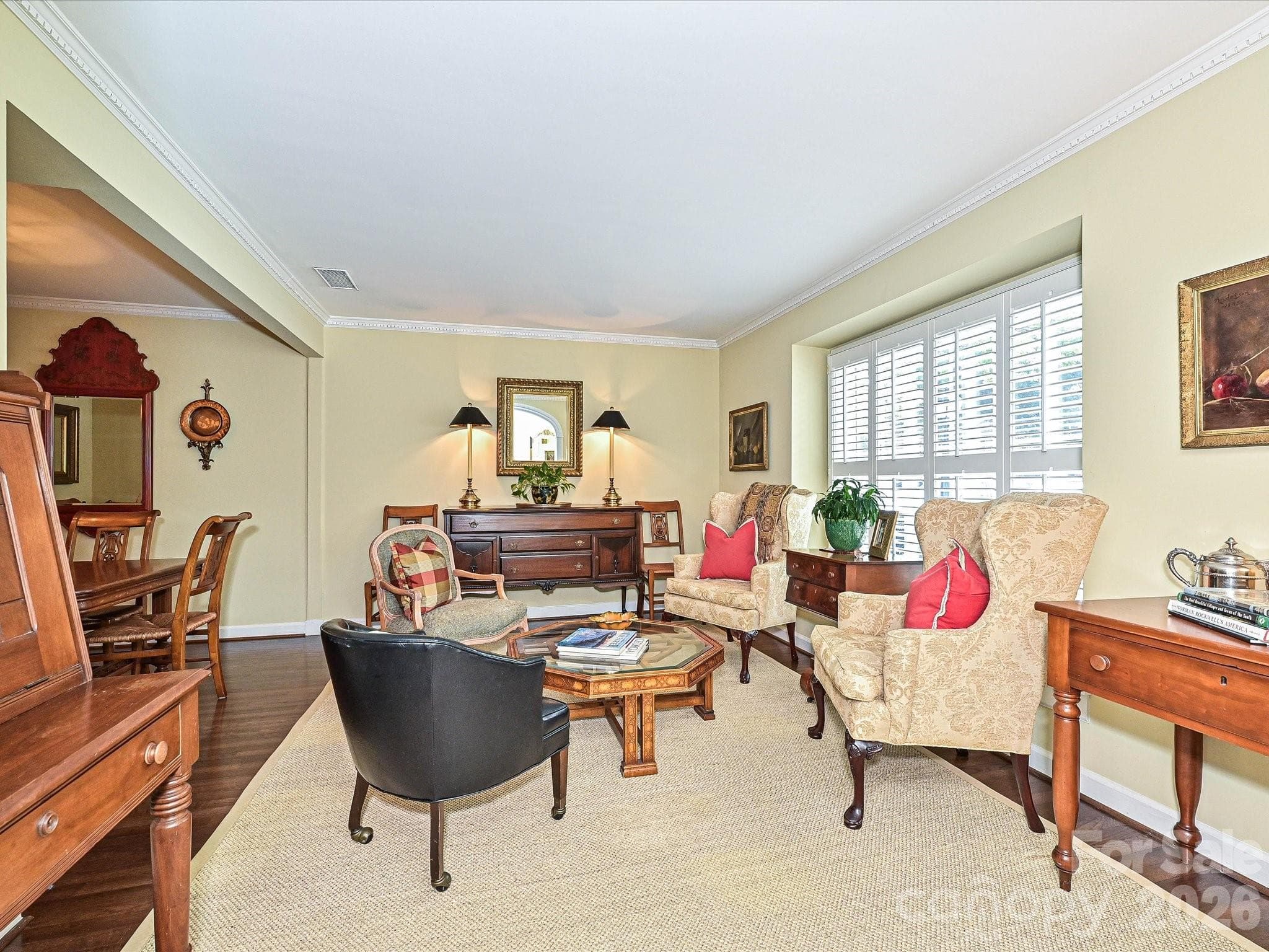 Front living room with large window and hardwood floors - 4313 Silo Lane, Charlotte