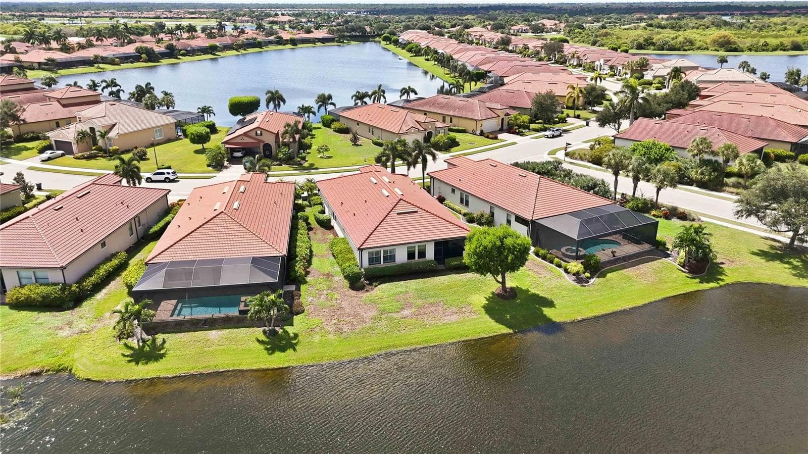 Beautiful view from the sky - water behind the home - large yard - 23739 WAVERLY CIR, VENICE