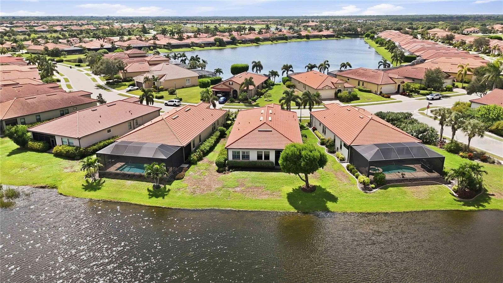 Beautiful view from the sky - water behind the home - large yard - 23739 WAVERLY CIR, VENICE