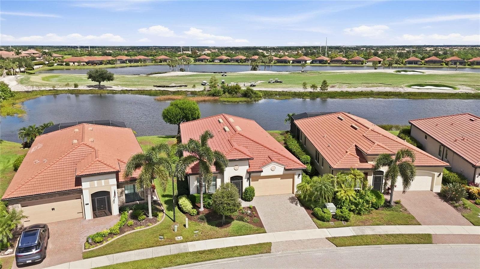 2nd house from the left - water in the back - 23739 WAVERLY CIR, VENICE