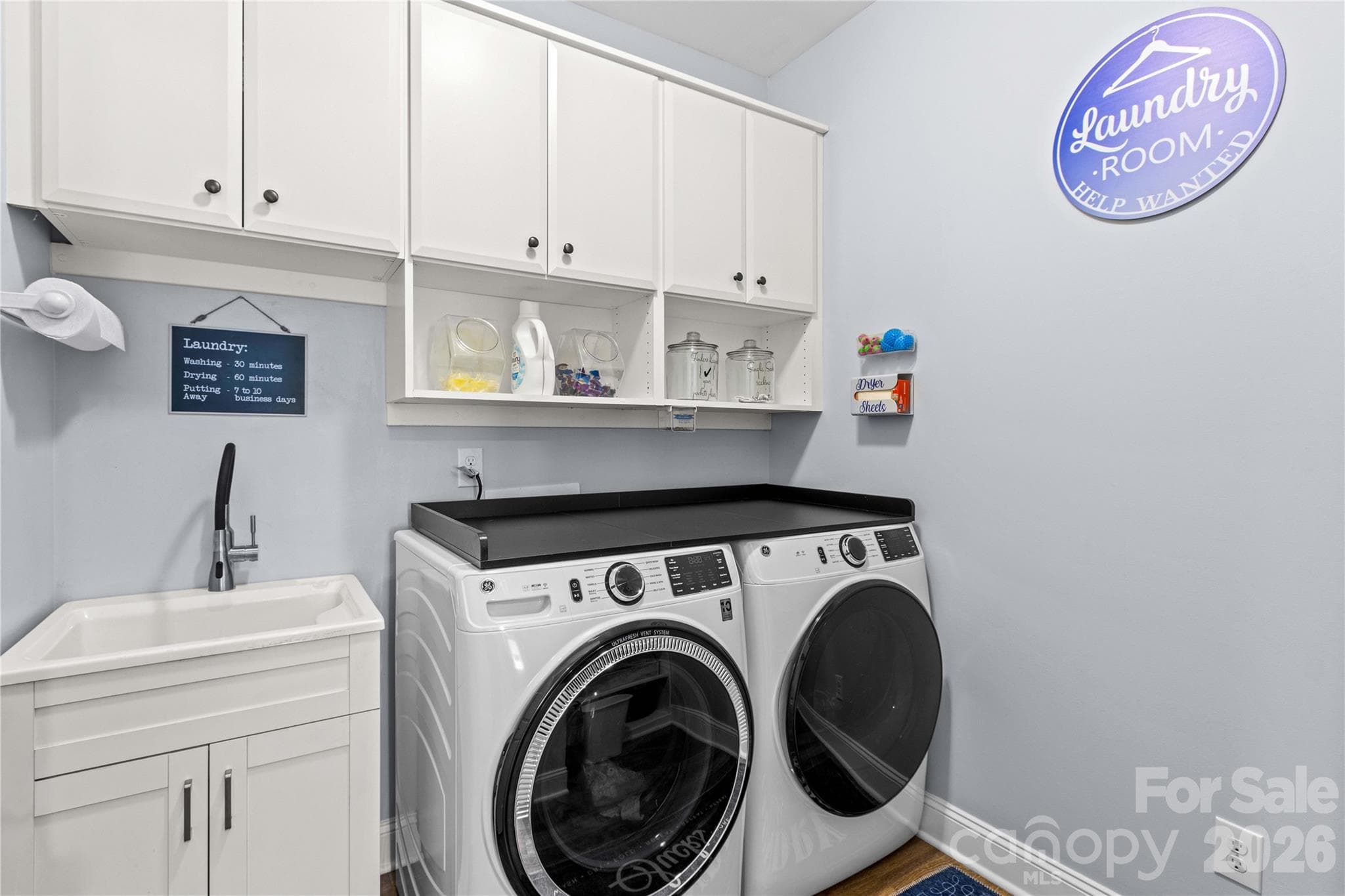 Custom Cabinets in the spacious Laundry Room - 111 Paradise Hills Circle, Mooresville