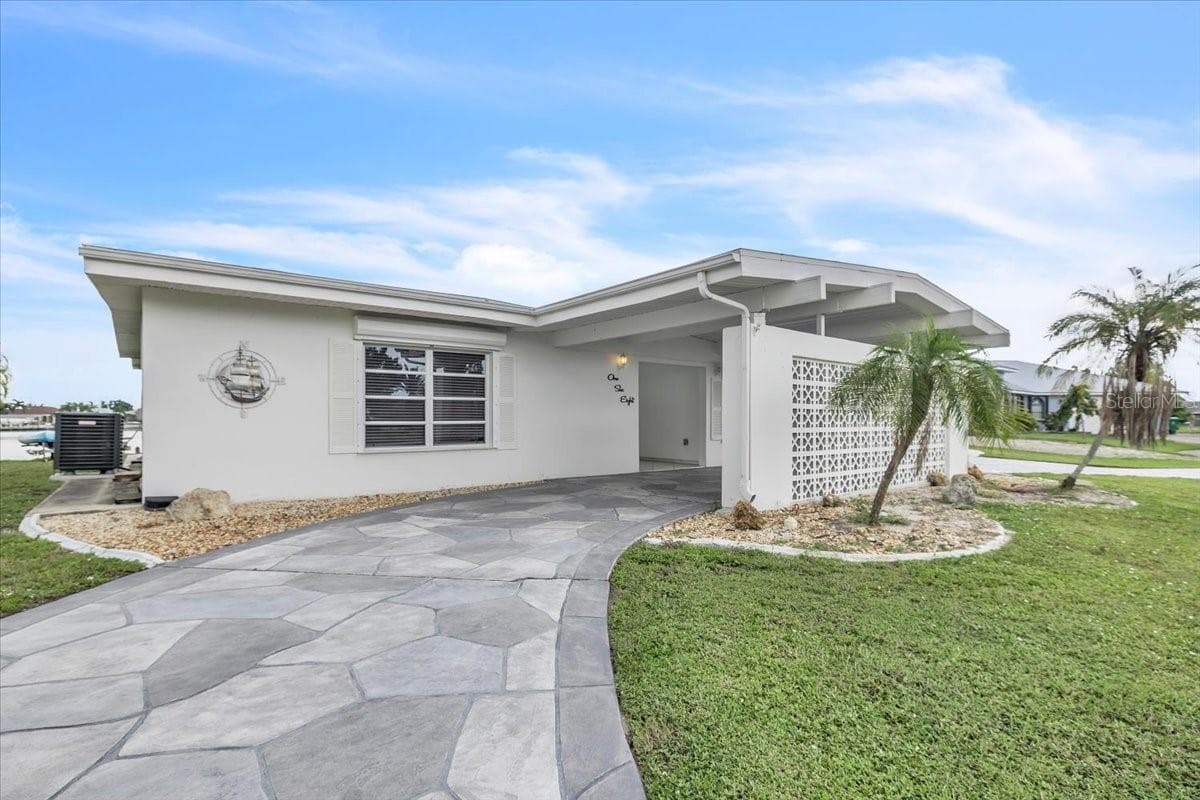 Single Family Residence at 168 MORGAN LN SE, PORT CHARLOTTE, photo 2 of 44