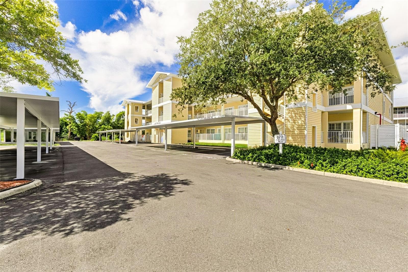 New Carports throughout with designated parking spots - 101 NATURES WAY #1307, ROTONDA WEST